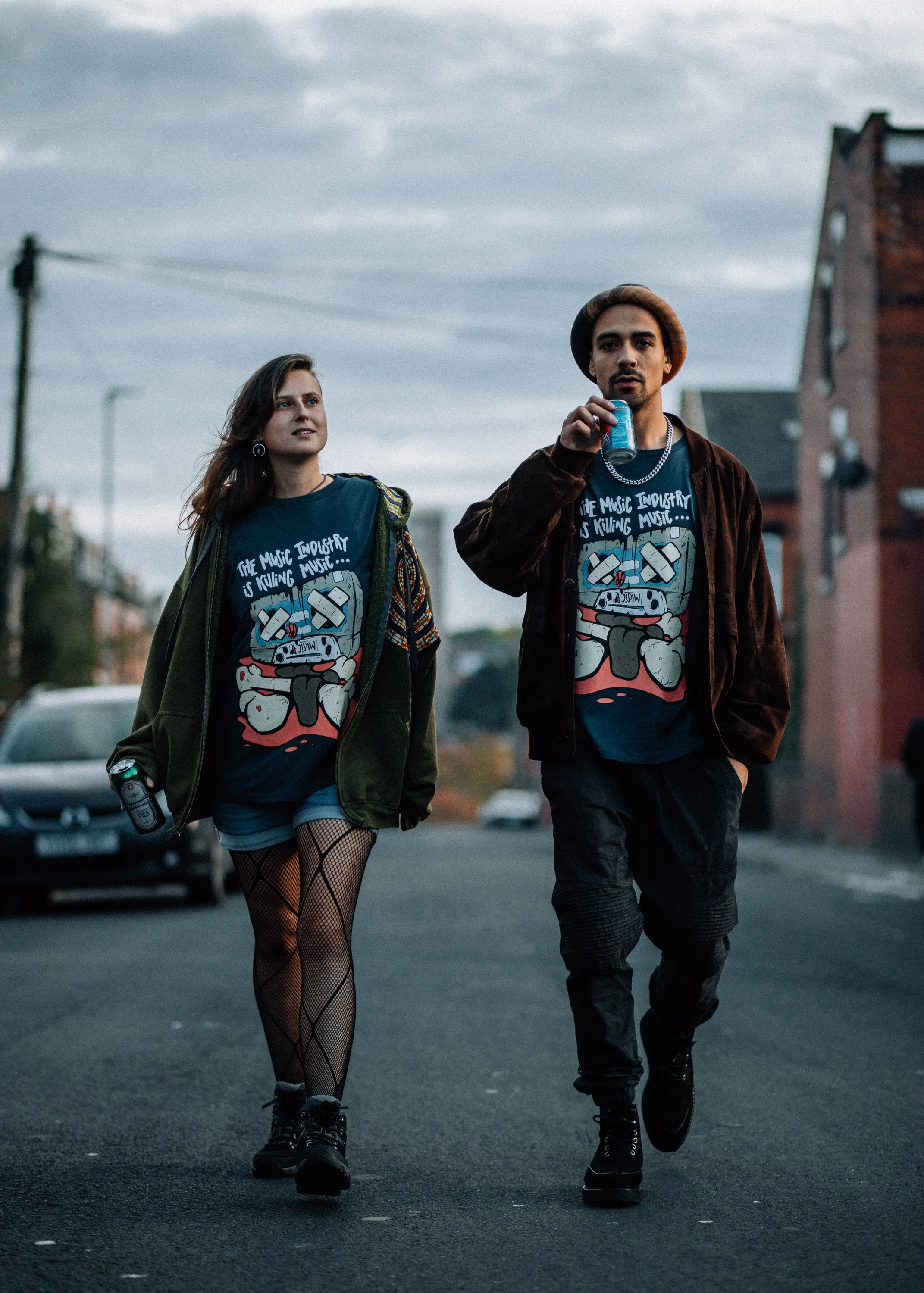Man and girl walk down the street
