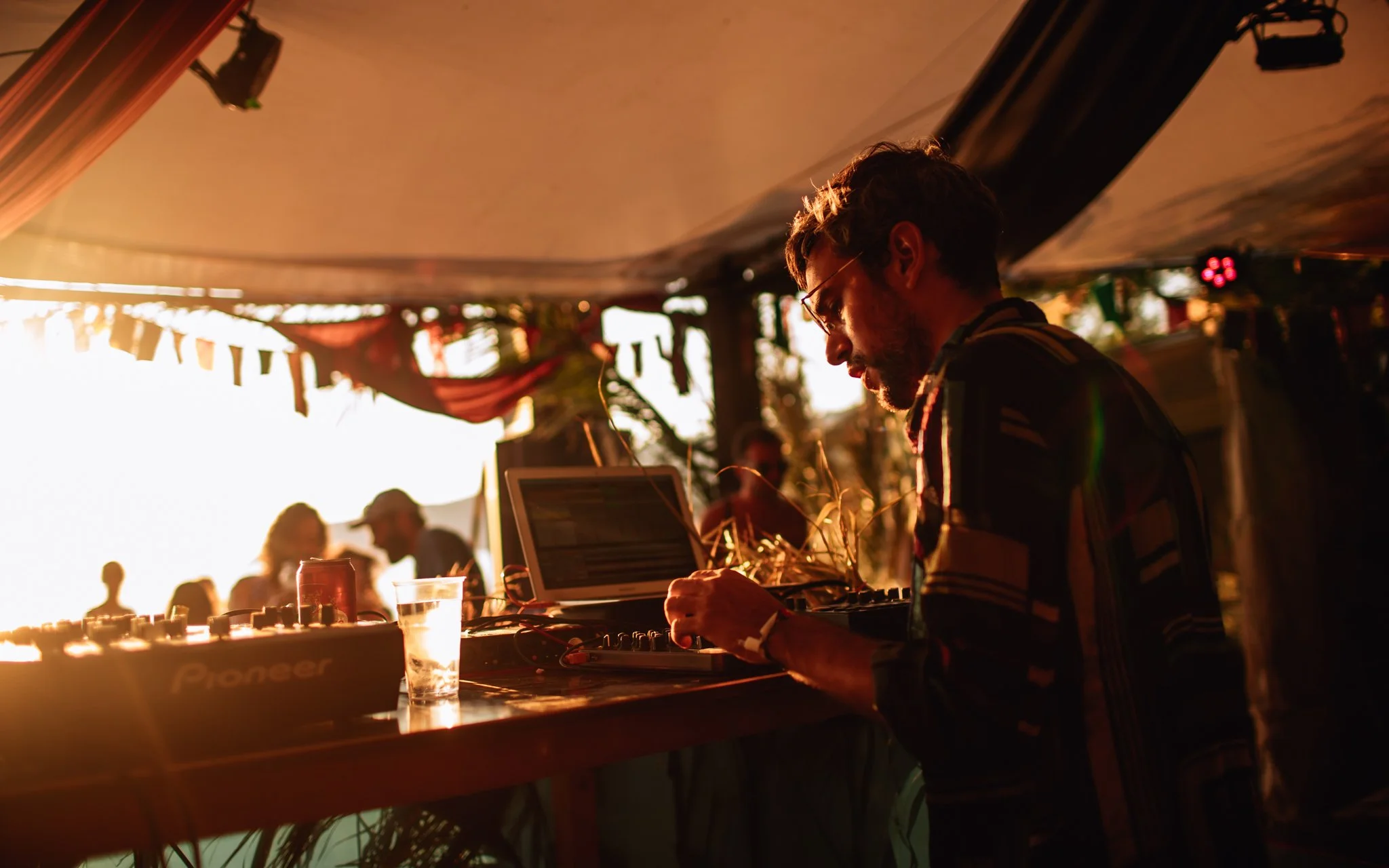A DJ please relax tunes on the beach at Goulash disco music festival in Croatia