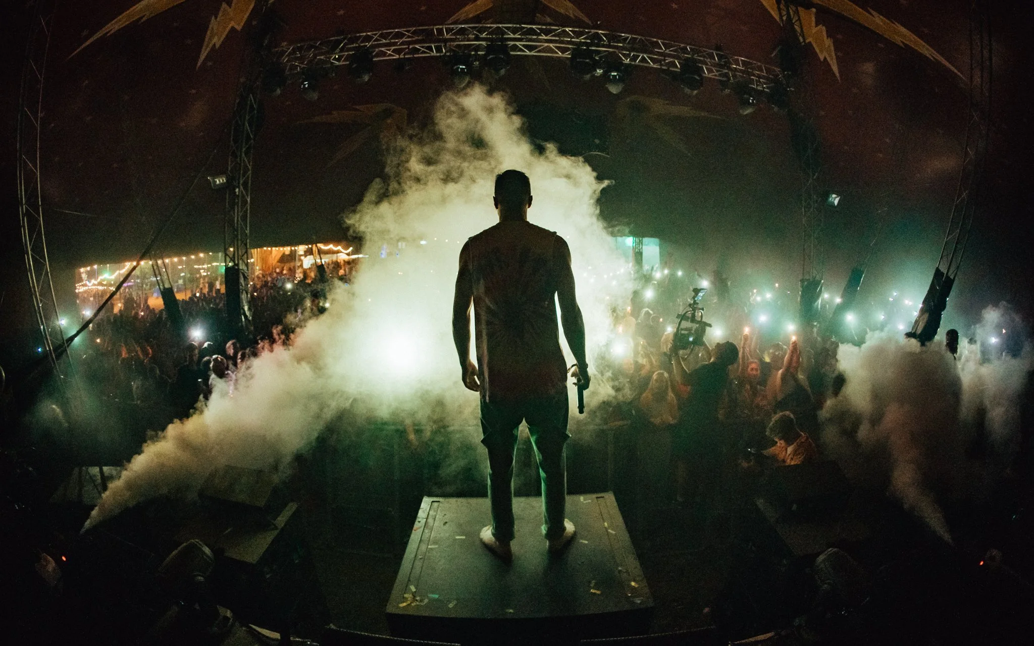  man stands on stage at El Dorado music festival