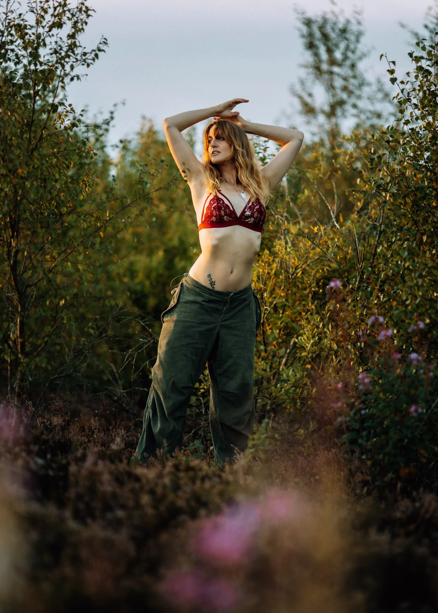 Girl poses in sunset