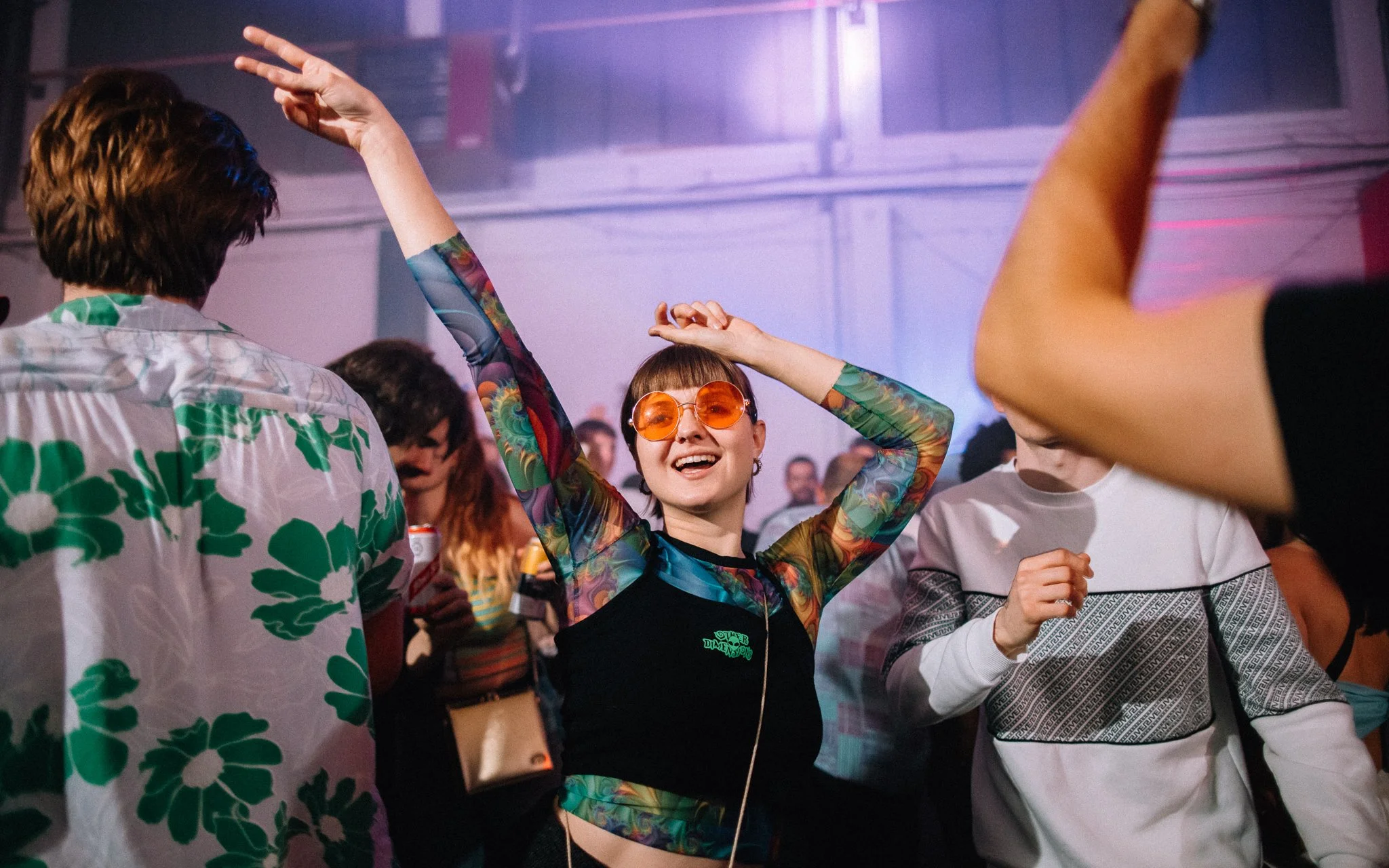 Girl dancing in the warehouse nightclub
