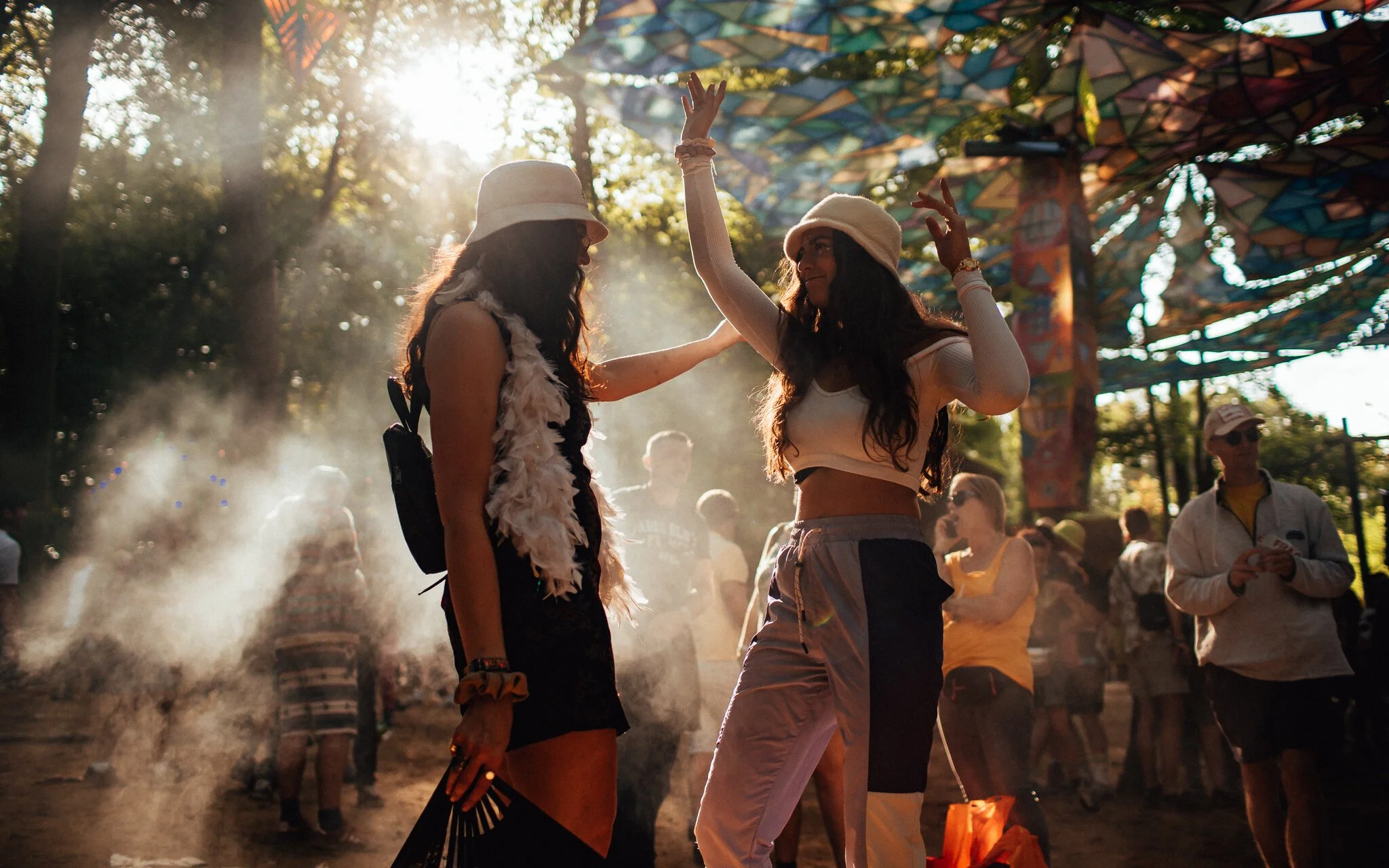  girls dancing at Music festival