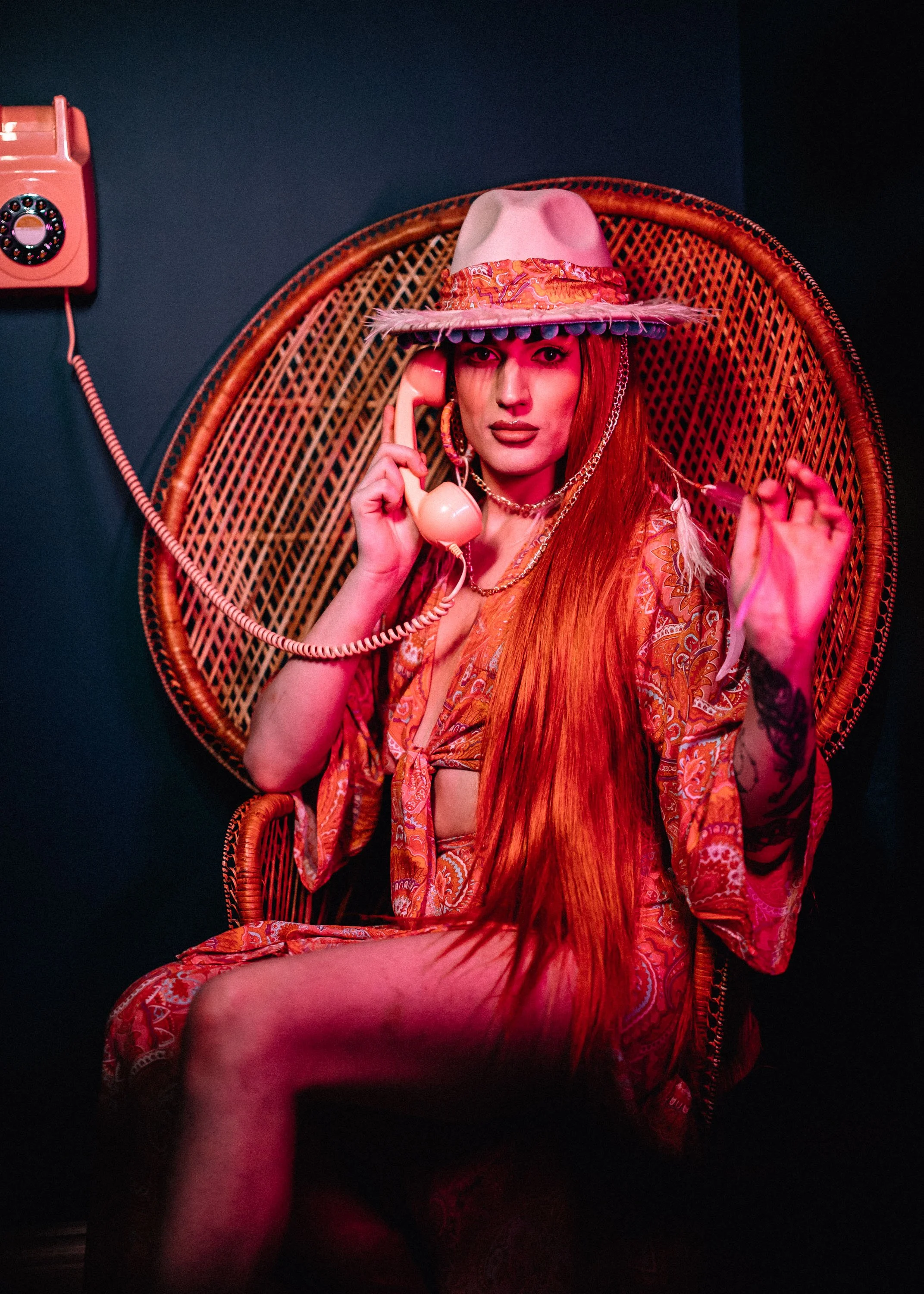 Girl in hippie inspired, outfits it in chat with telephone