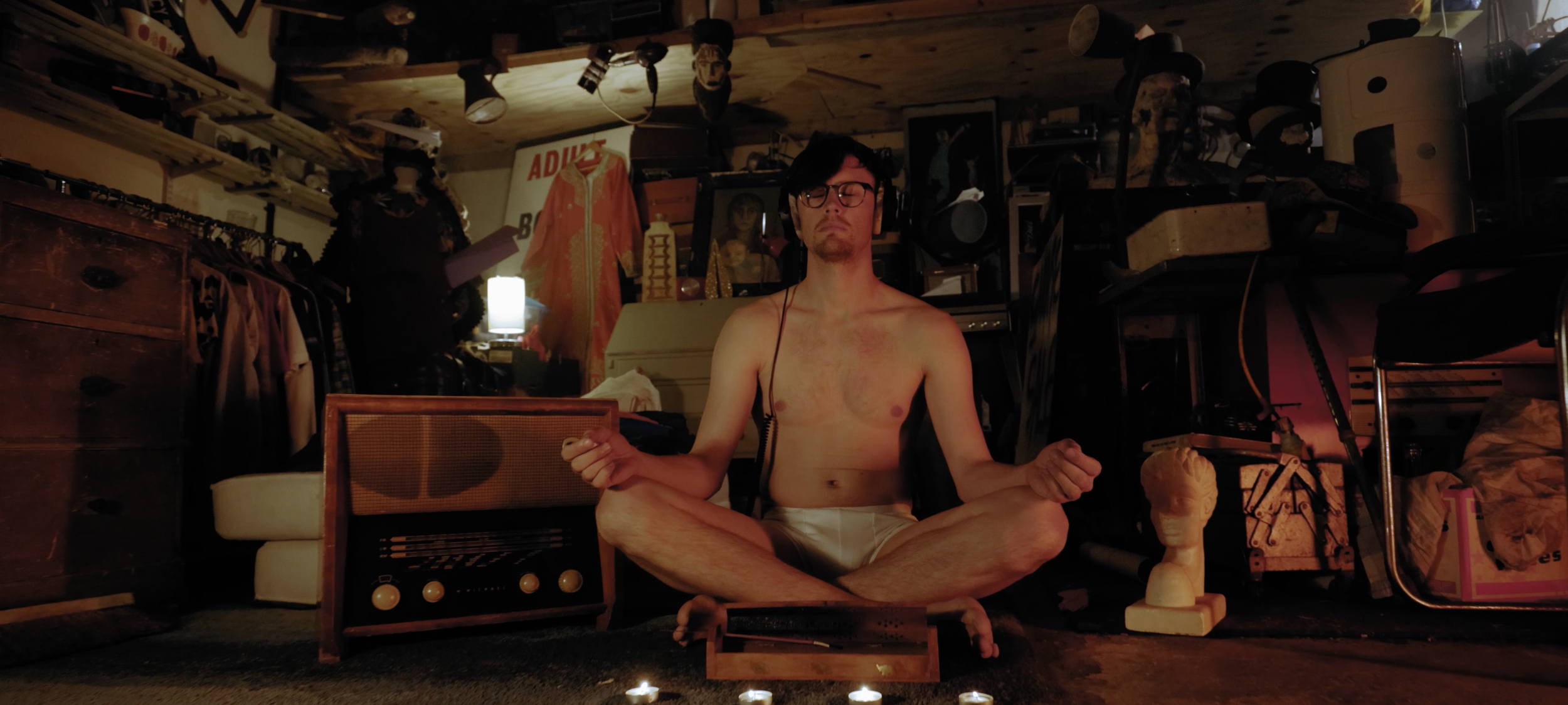 Twogood dream Music Video, Garry fingerloaf meditates in garage