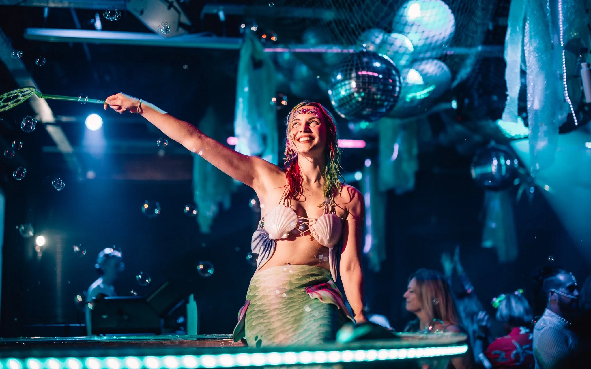  mermaid performer in nightclub