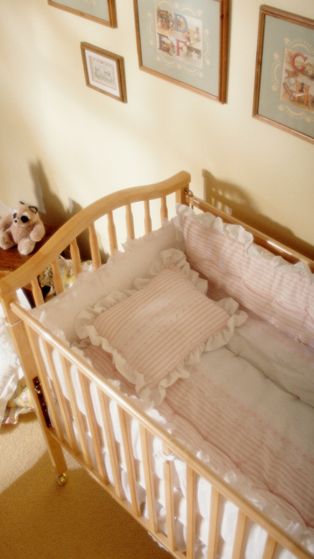 Image carousel of photos highlighting key themes and plot points of Shawna Holly's second novel, When We're Broken. This image shows a vintage baby crib bed and nursery decor.