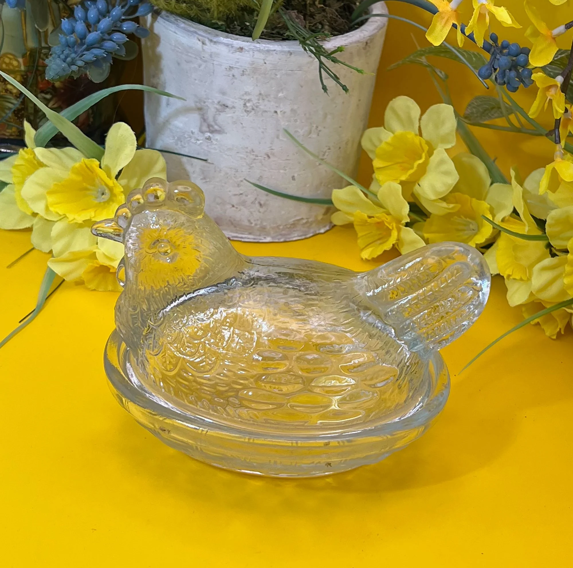 Small, glass chicken dish