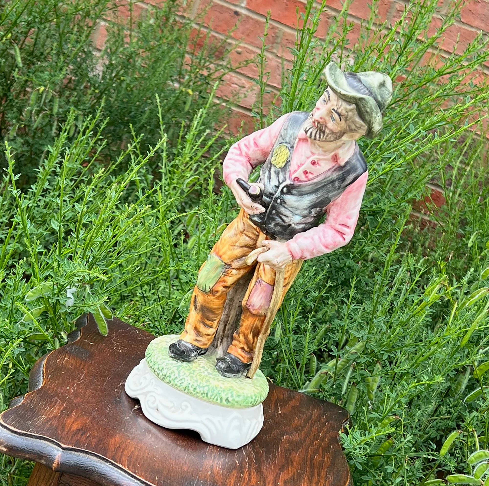 Man Smoking Pipe Figurine