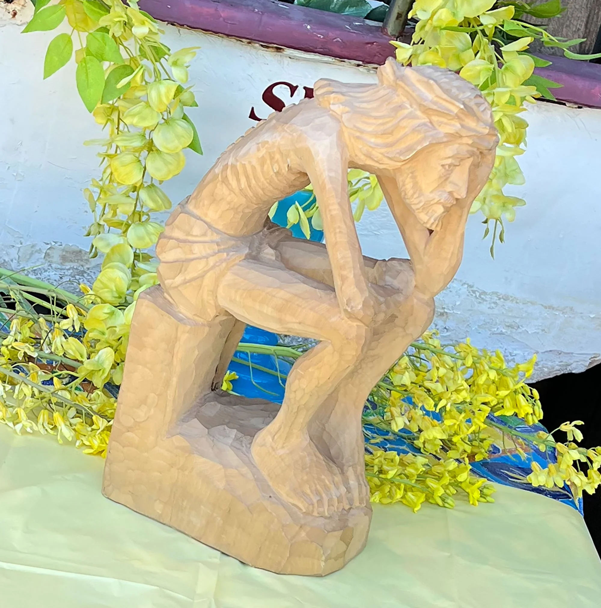 Carved Contemplative Seated Christ Figure