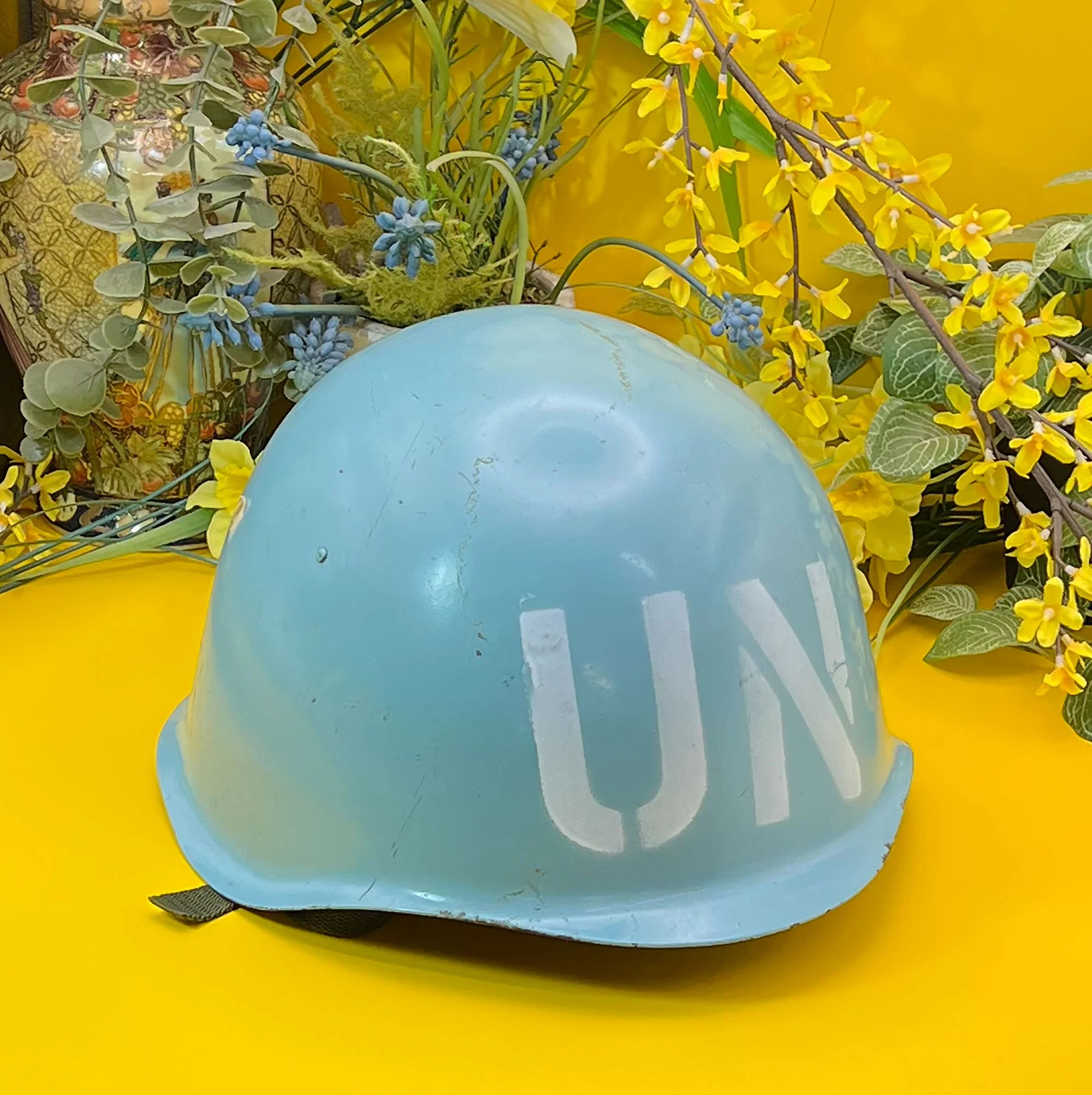 Blue, metal UN helmet