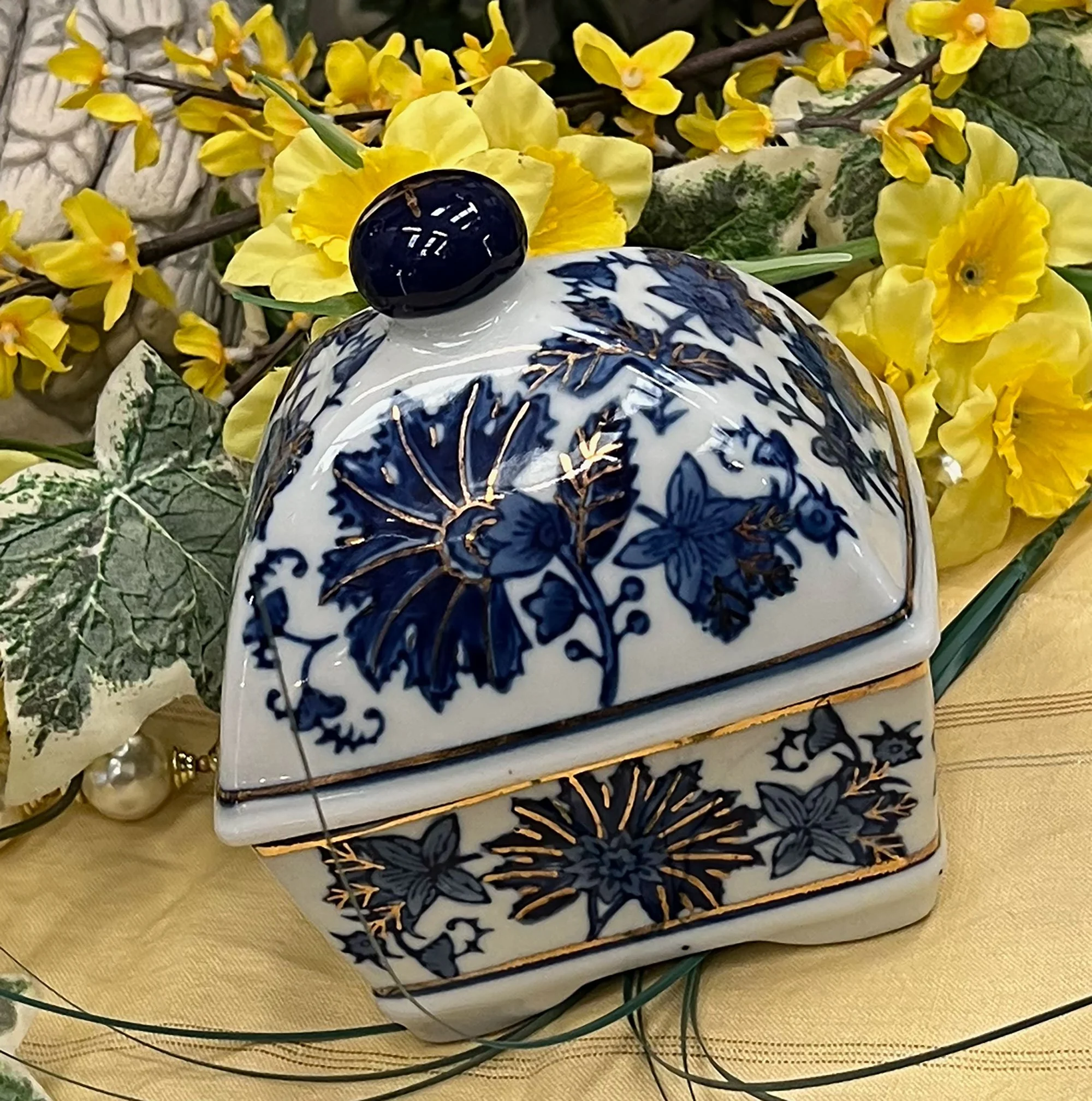 Blue and white jar with hand applied gold detail