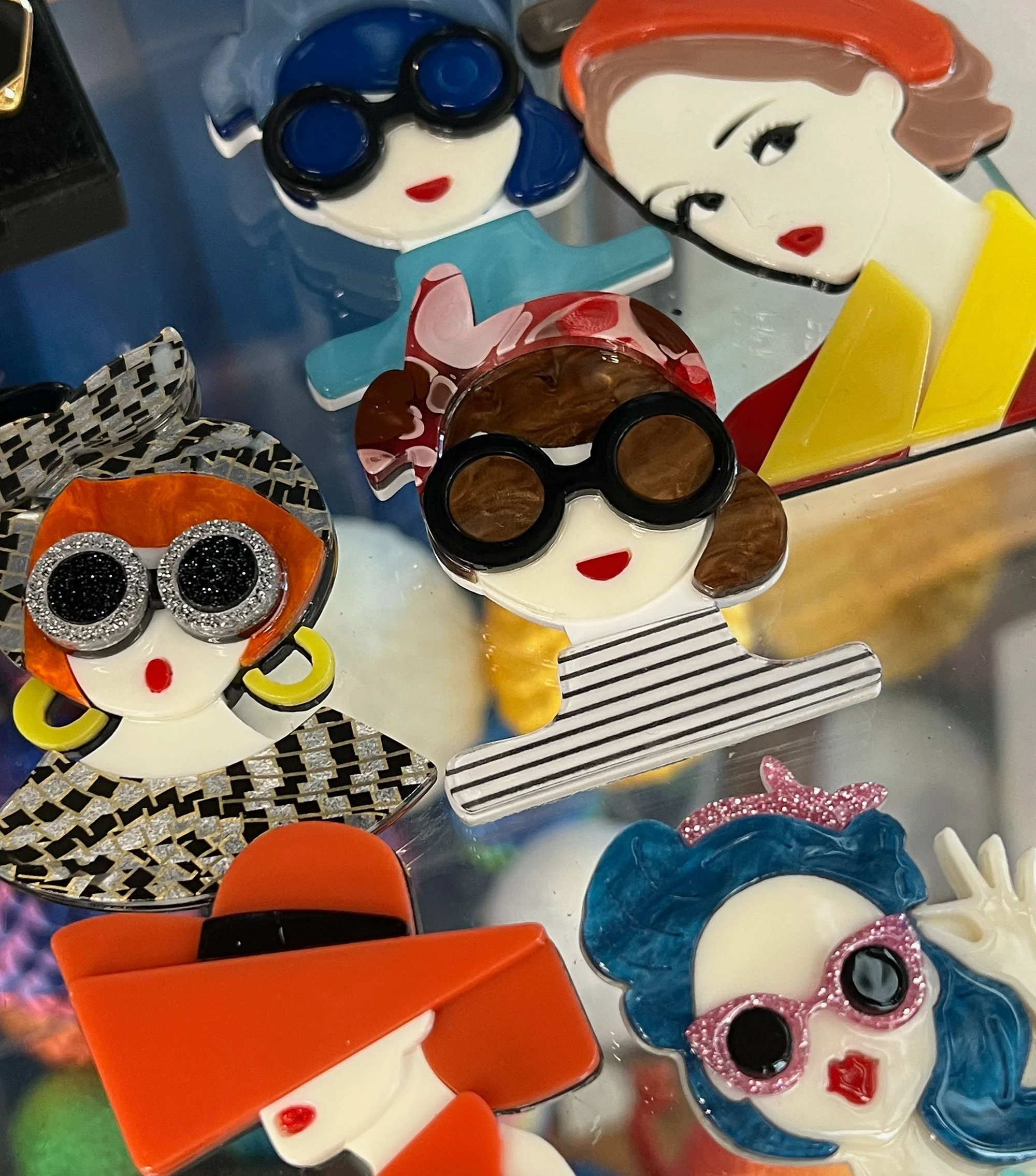 Fun, synthetic brooches