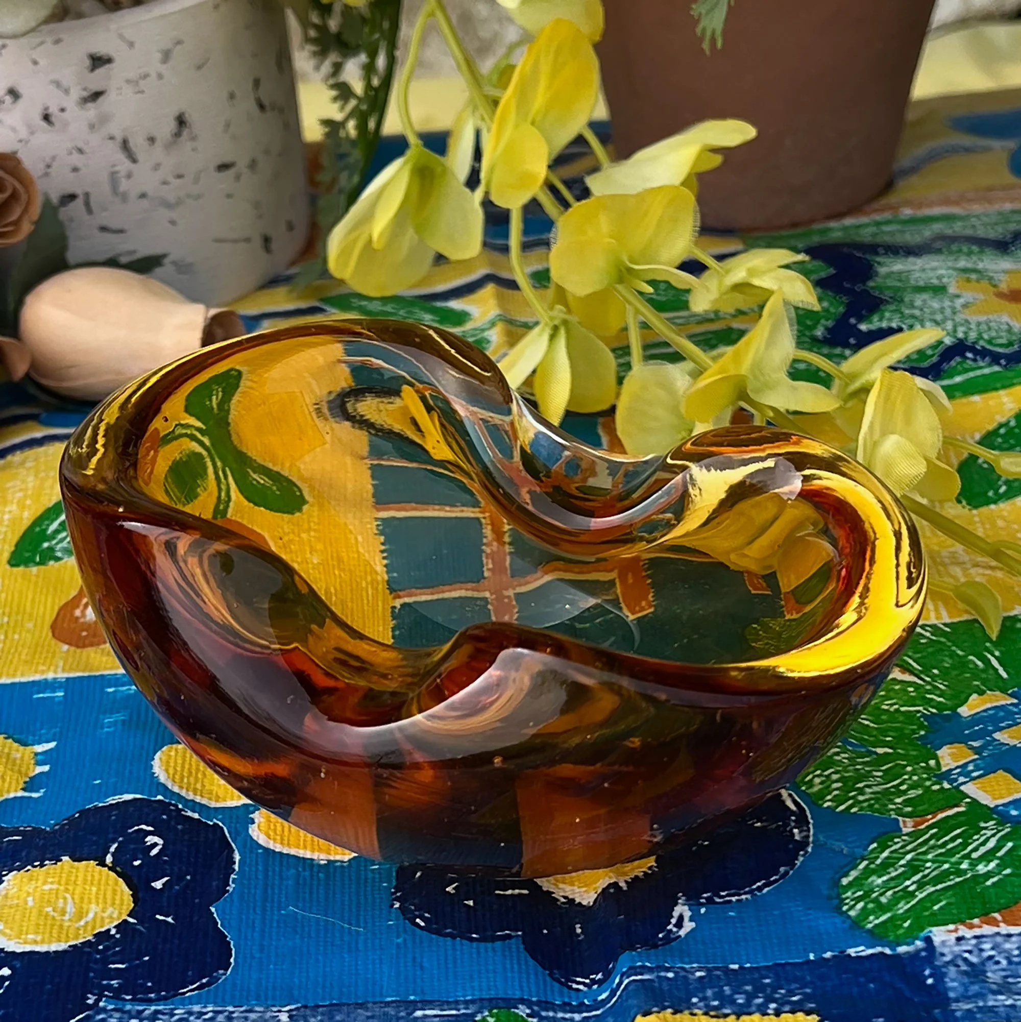 Amber glass ashtray