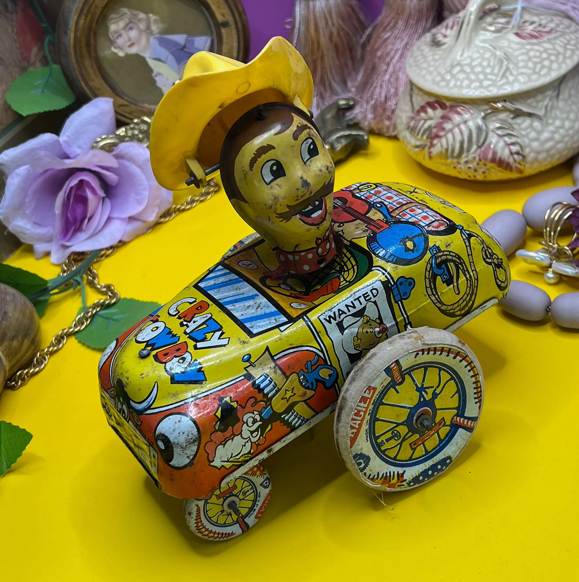 Tin plate clockwork toy Crazy Cowboy