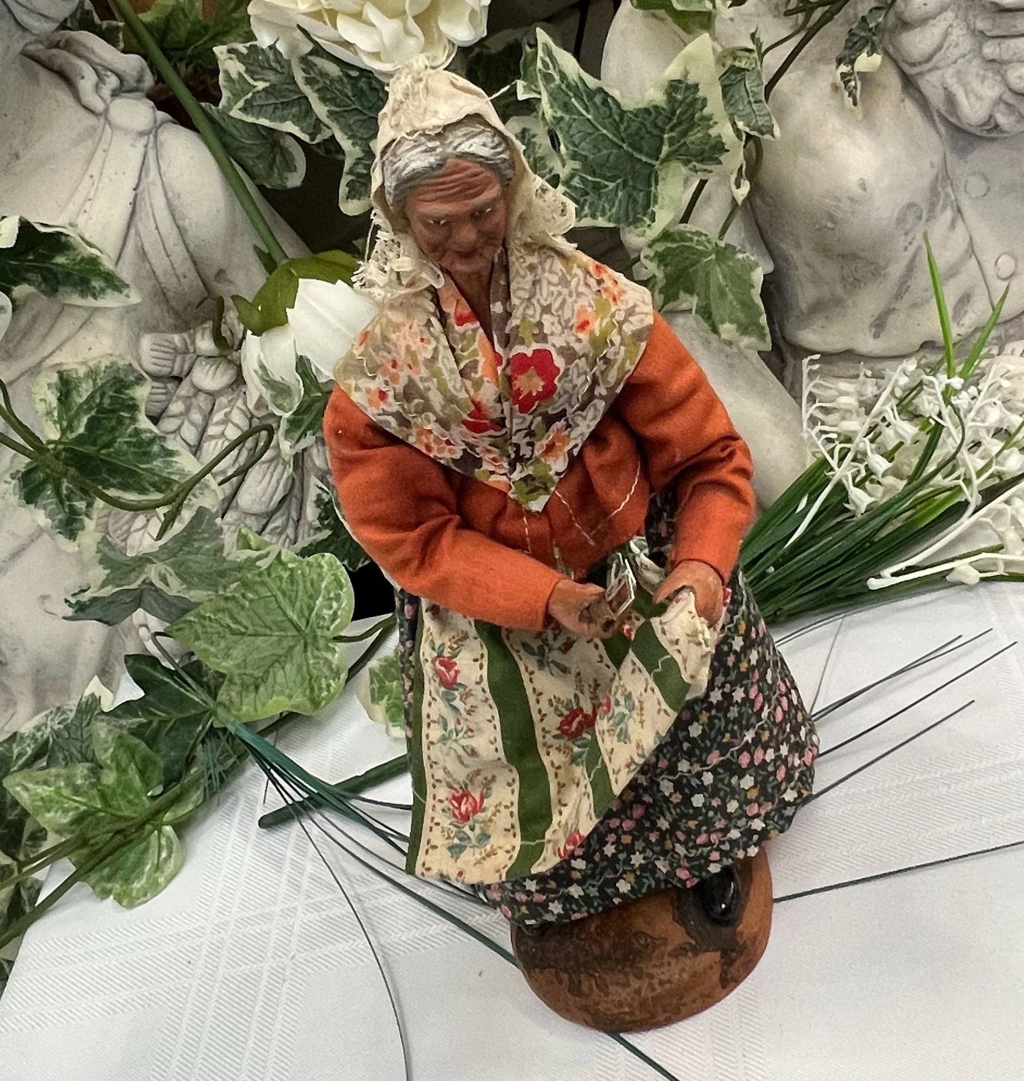 Doll Figure Holding Apron