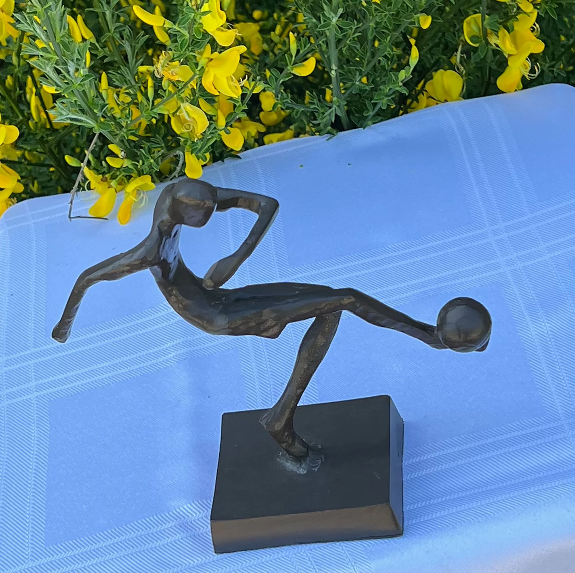 Metal football sculpture