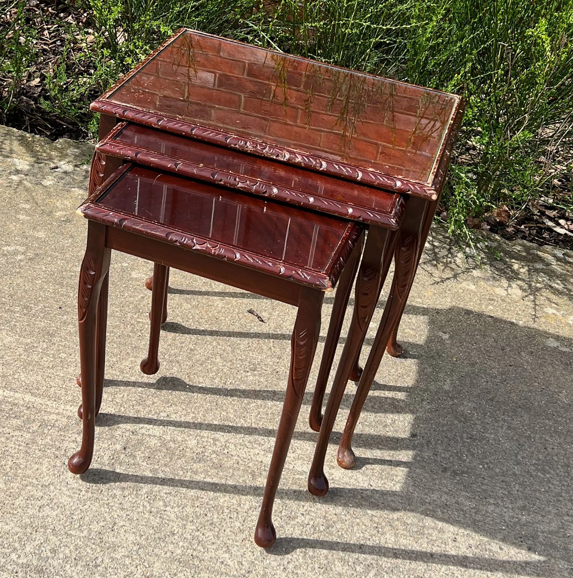 Nest of glass topped tables