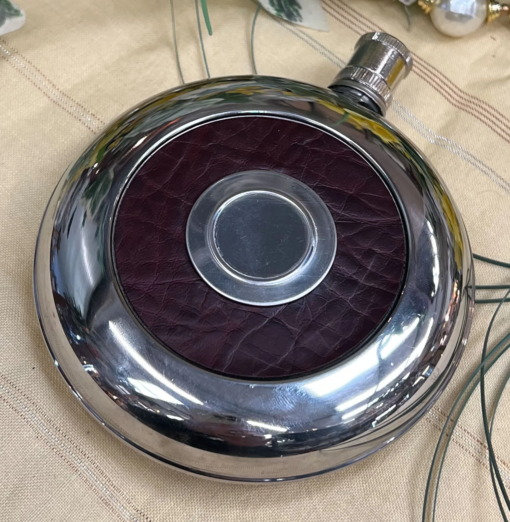 Stainless steel and leather hip flask