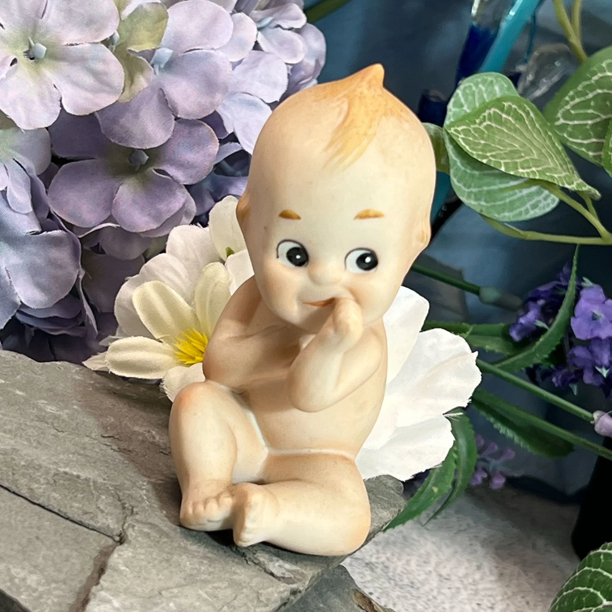Kewpie Doll Sucking Thumb