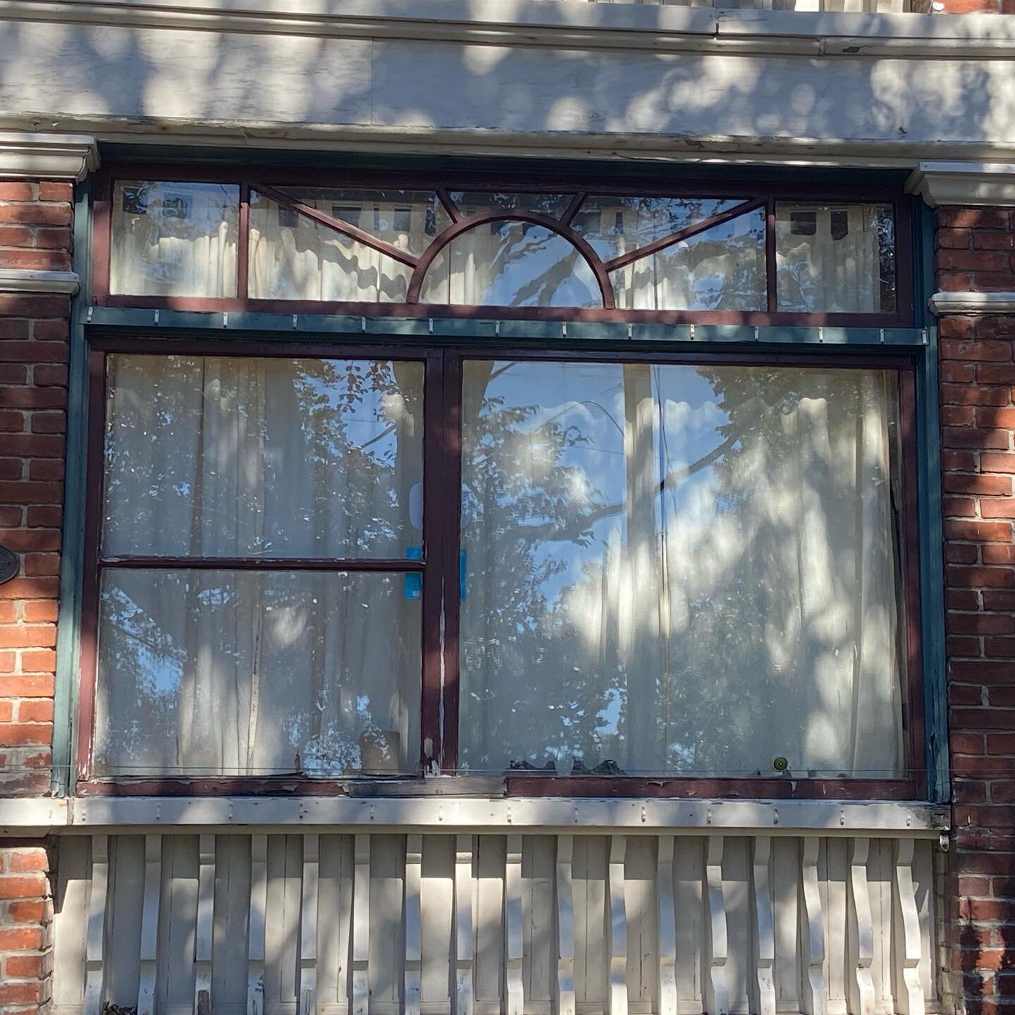 This rad wood window is on a house that overlooks the Ogden Point shipping piers and Victoria Harbour. I love the sun shape! 

&ldquo;138 Dallas Road, built in 1908, is valued as an outstanding and unique example of the Classical Revival style that w