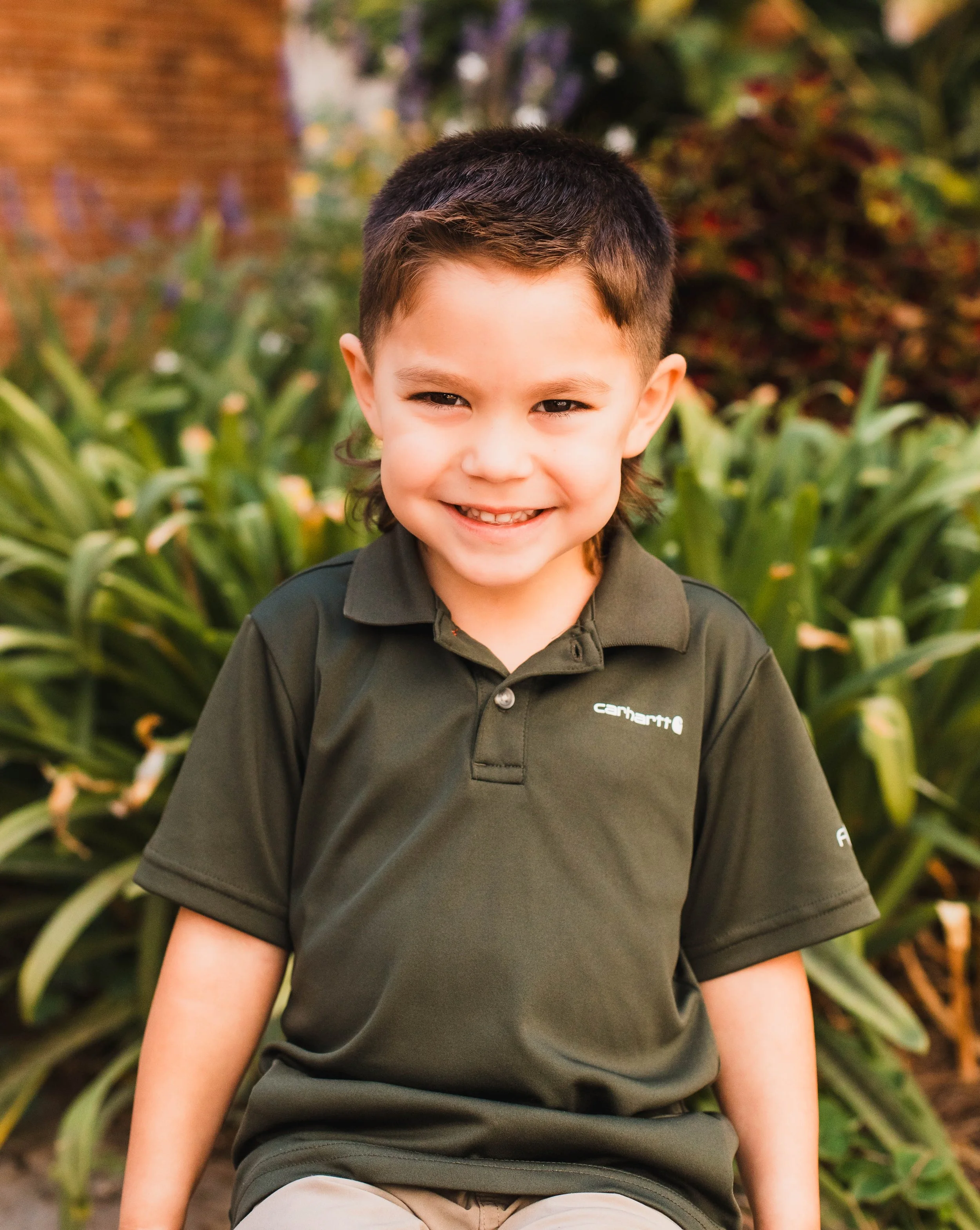 Precious boy smiles for camera