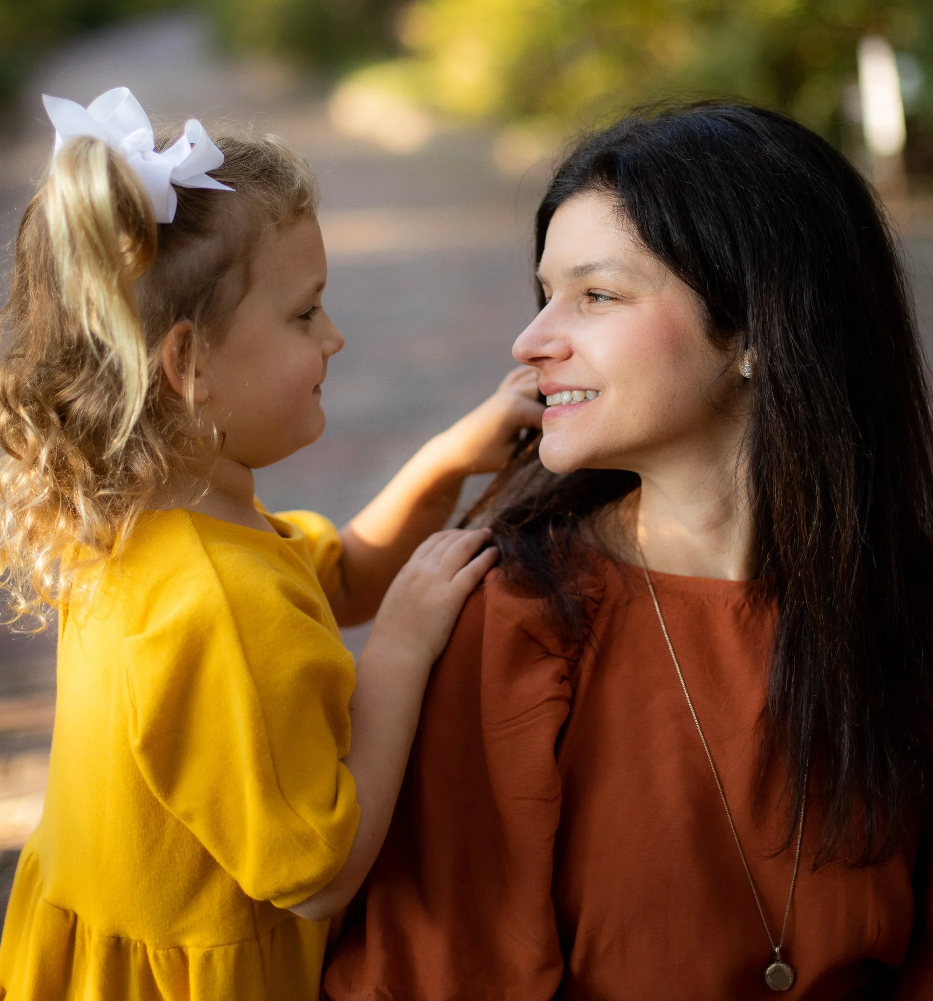 Sweetest daughter fixing mom's hair - Maclay Gardens