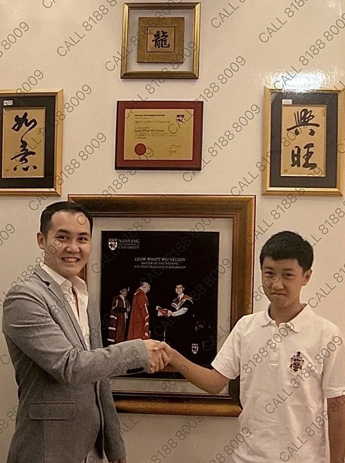 SUPER TUTOR NELSON LEOW SHAKING HANDS WITH RAFFLES INSTITUTION PRINCIPAL