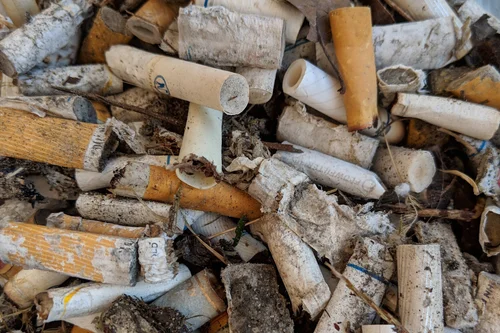 is it illegal to ash a cigarette on the ground Cigarette Butts Hurt the Dirt — A Greener Future