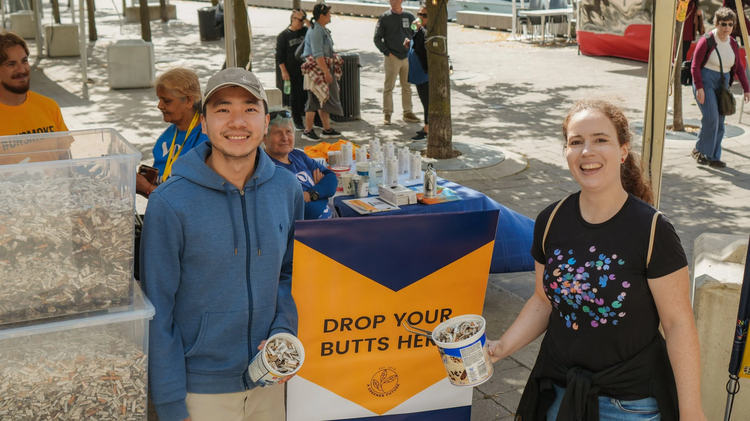 Volunteers at the UNSMOKE Butt Blitz at Harbourfront Centre in Toronto