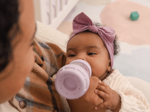  Newborn baby lifestyle photography with pacifier baby brand content production 