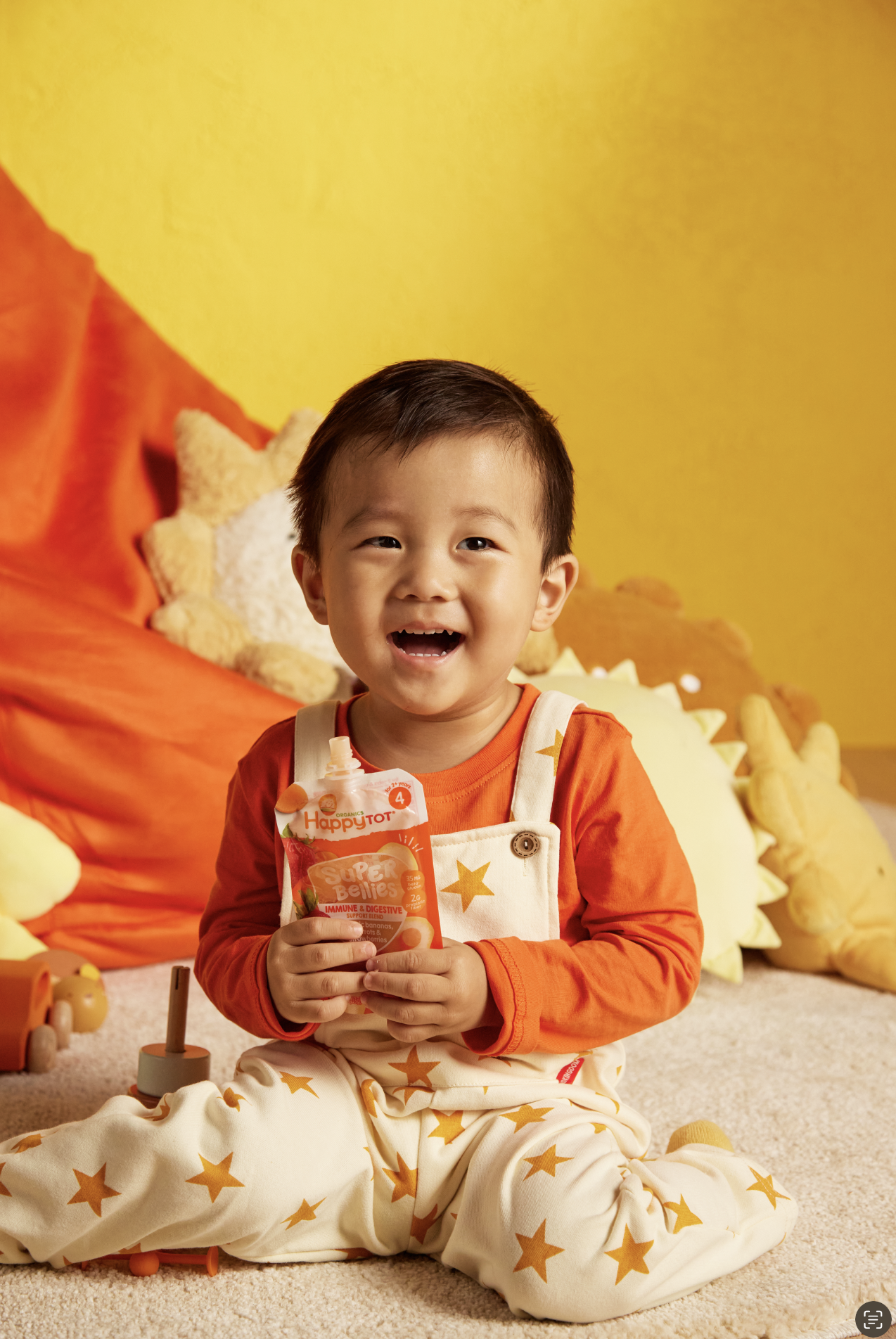  Toddler boy holding juice bottle lifestyle photography kids CPG brand 