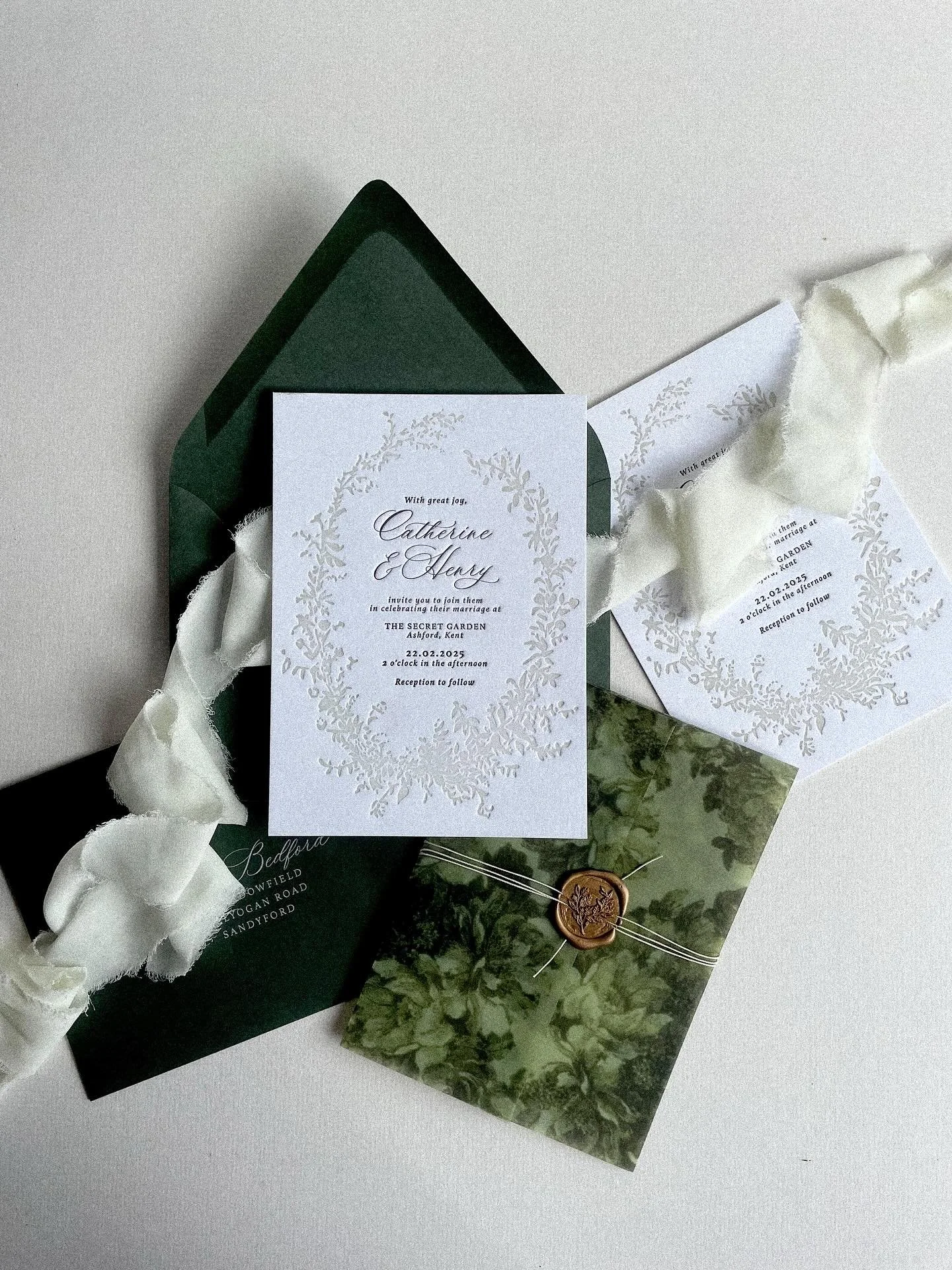 Timeless elegance meets refined detail.

Bespoke wedding invitation suite designed for the modern couple with an eye for luxury.

Perfectly layered textures, rich greens, and a floral vellum wrap elevate this suite to heirloom status - because your l