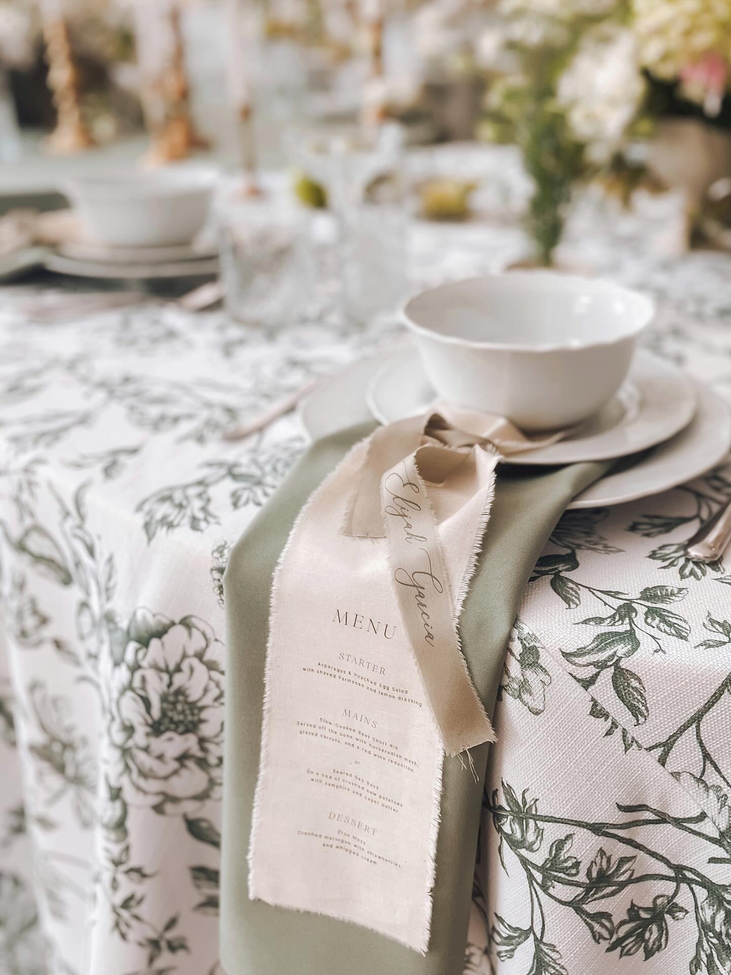 When planning a wedding, every detail matters.

Elevate your tablescape with bespoke fabric menus and name tags. Unlike paper, fabric adds a touch of luxury and texture that will leave a lasting impression on your guests.

Whether you&rsquo;re hostin