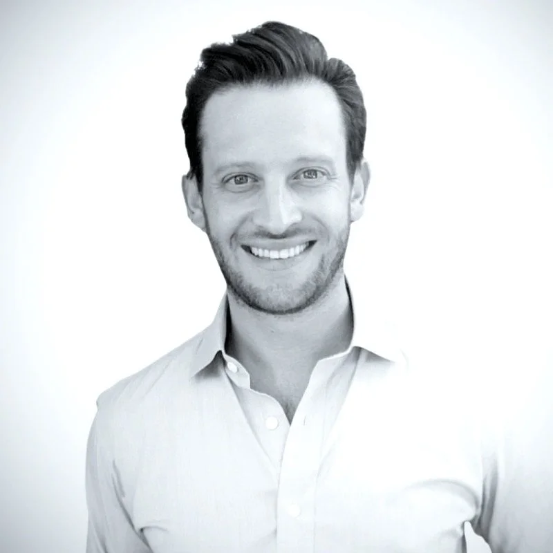 DREW FABRIKANT WEARING WHITE COLLARED SHIRT