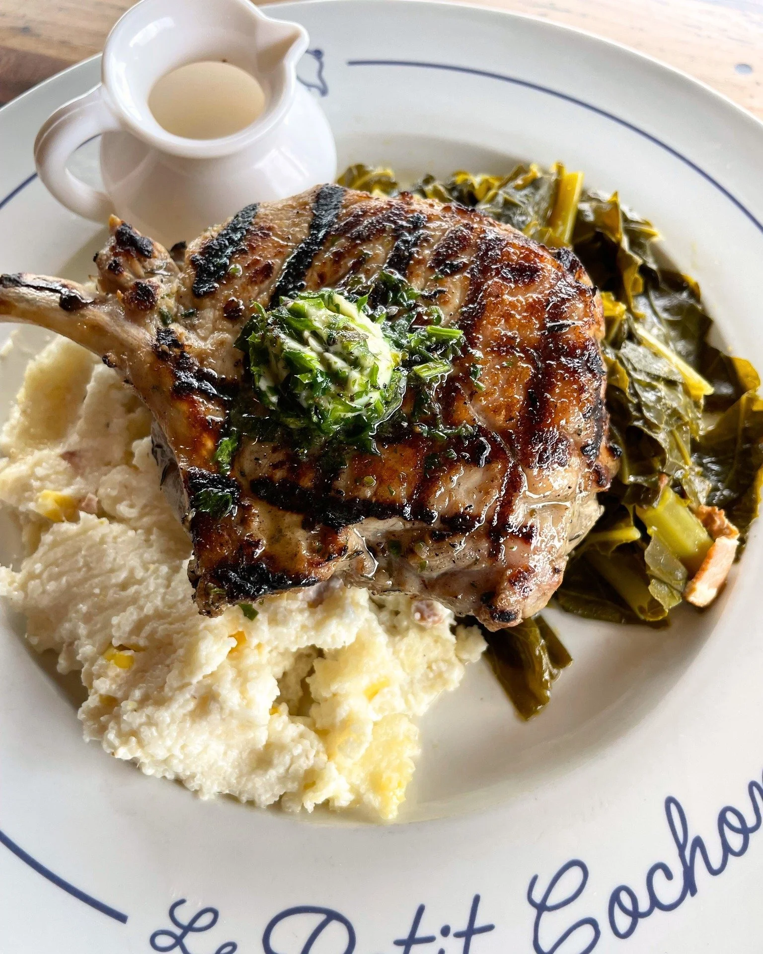smoked-pork-chop-collard greens-grits-and-mustard-cream-sauce.jpg