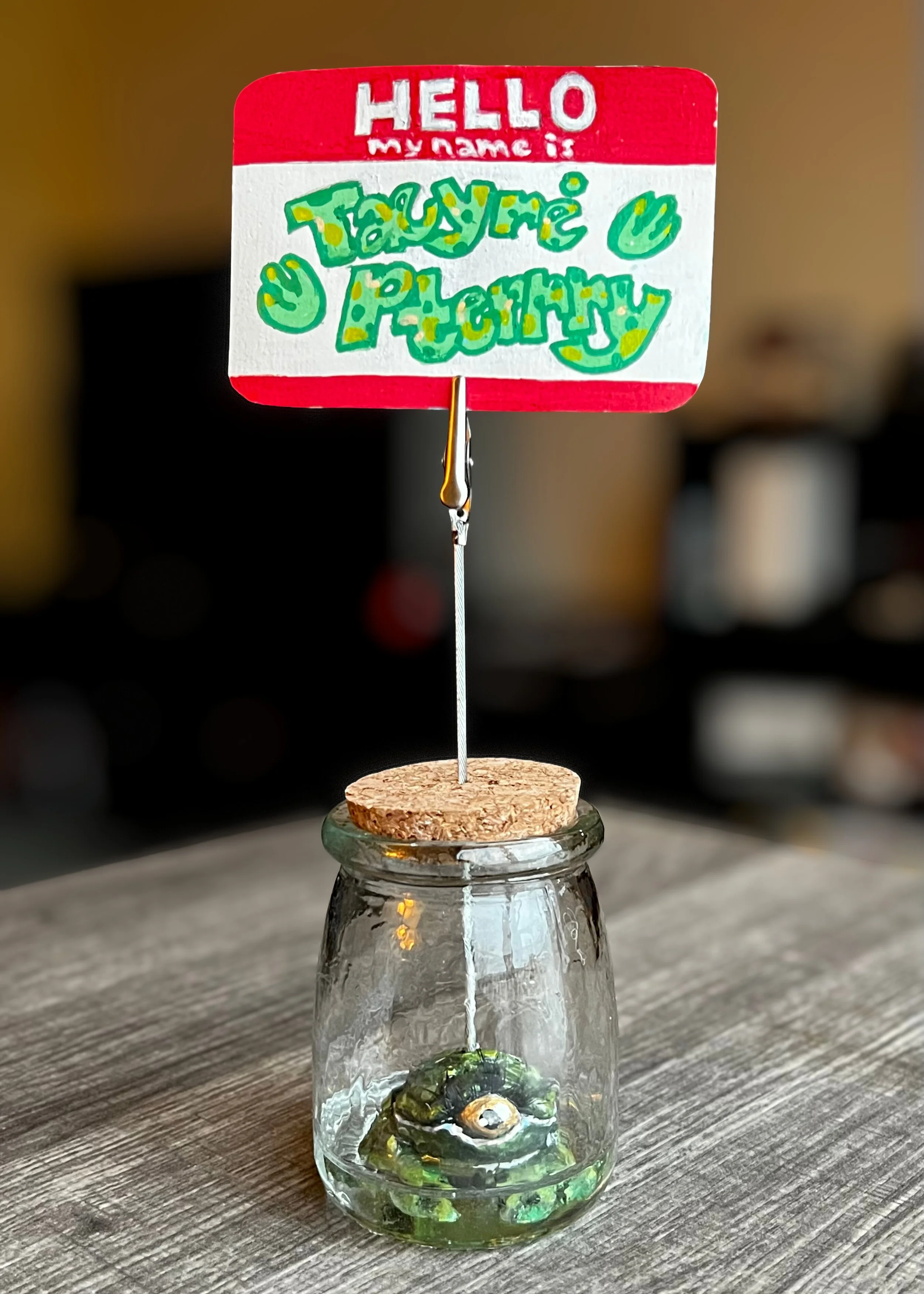 Tæyrė Pterry, 2025, clay, acrylic paint, markers, colored pencil, and jar, 3" x 5" x 9.5"