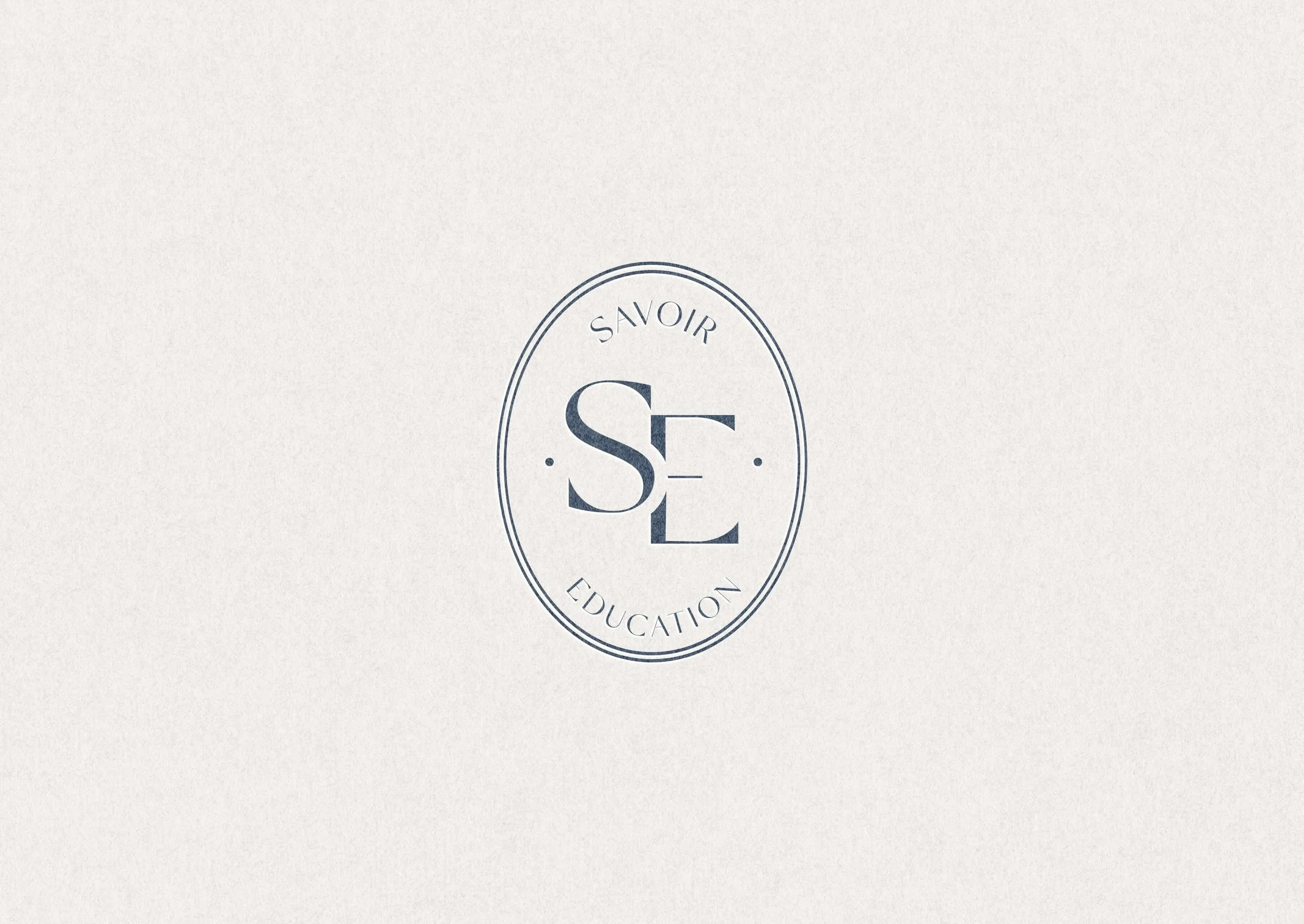 Savoir Education brandmark logo design — SE monogram in oval seal.