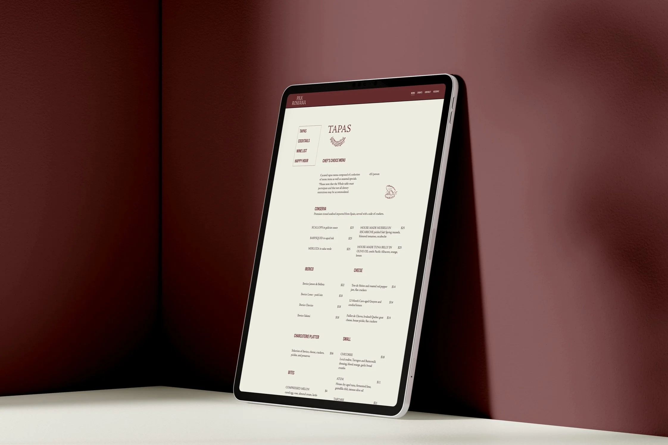 Pax Romana digital menu design displayed on tablet