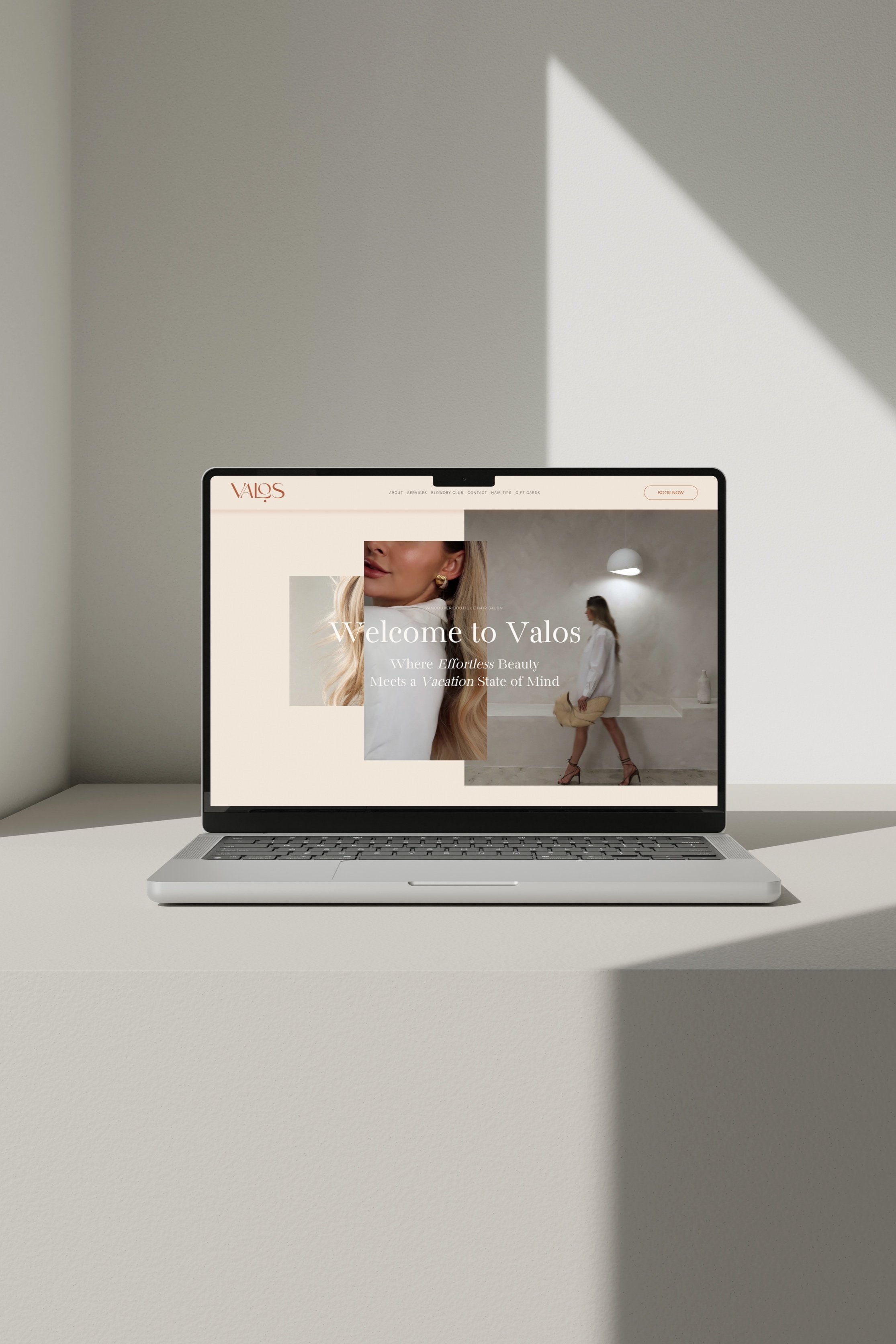 Valos hair salon one-page website design shown on laptop mockup