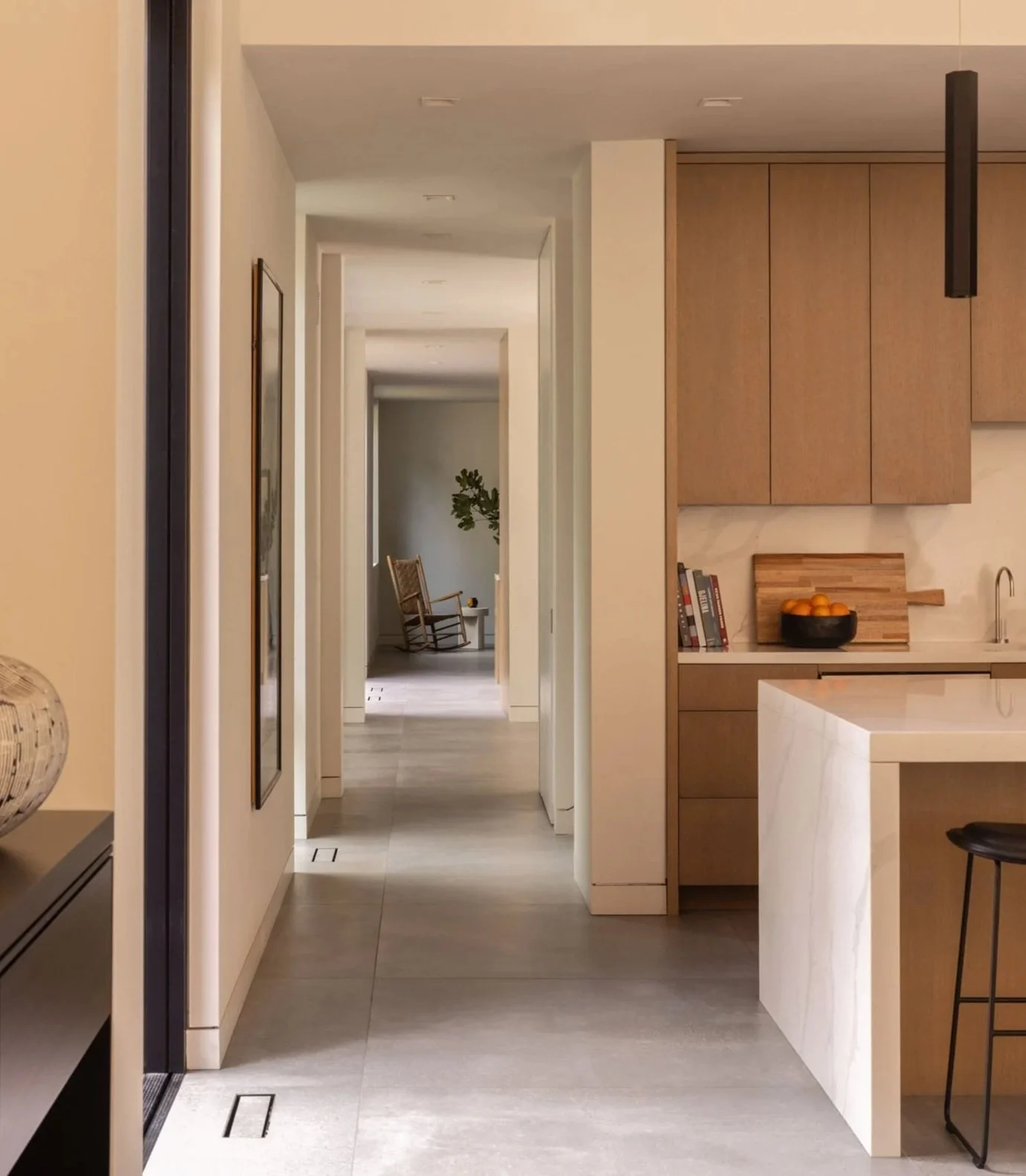 View axis through kitchen, rhythm of daylight, architectural focal point