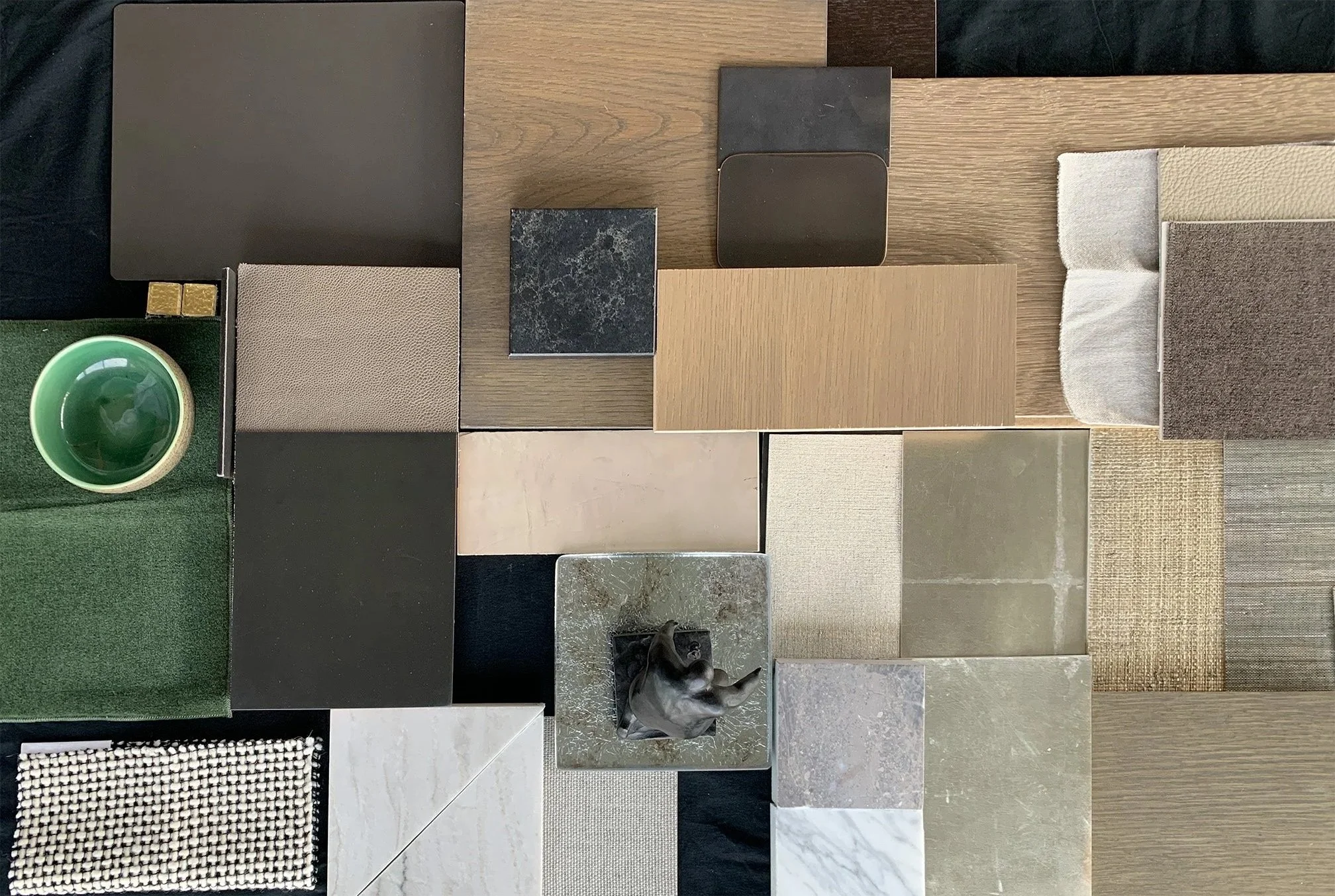 Material palette modern penthouse natural tones, gold and bronze accents