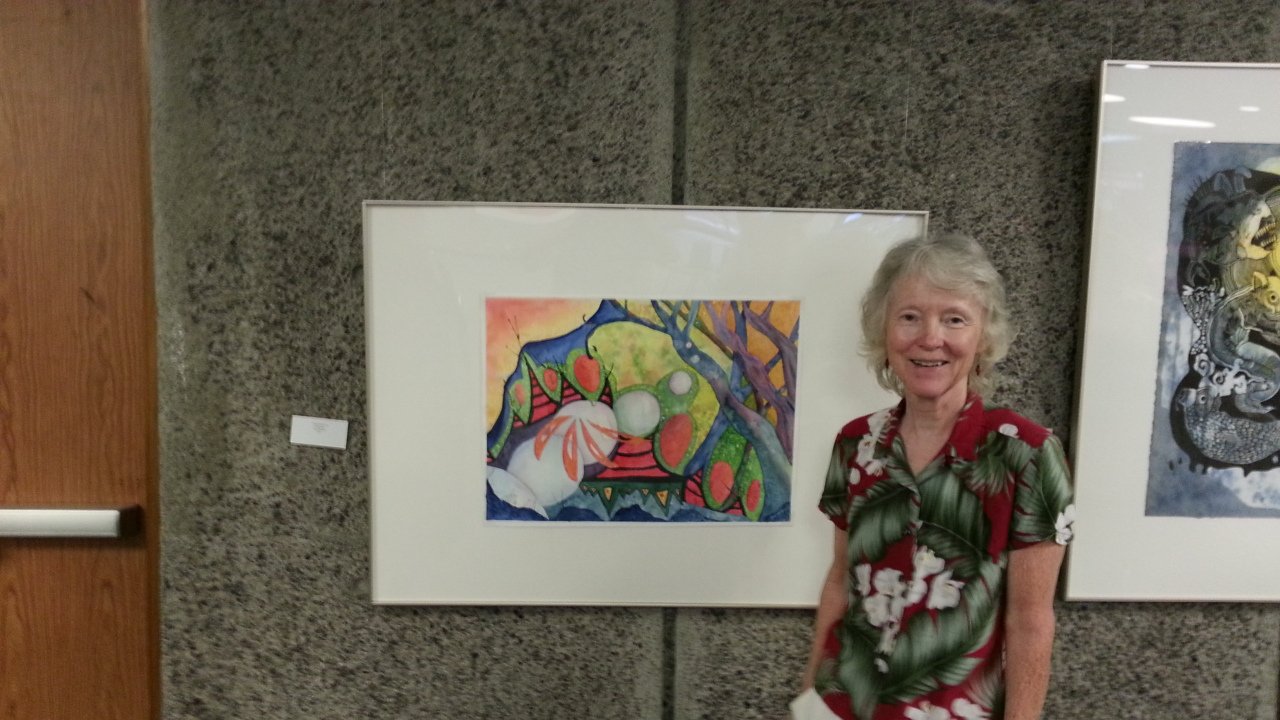 Carol's painting at an art exhibit