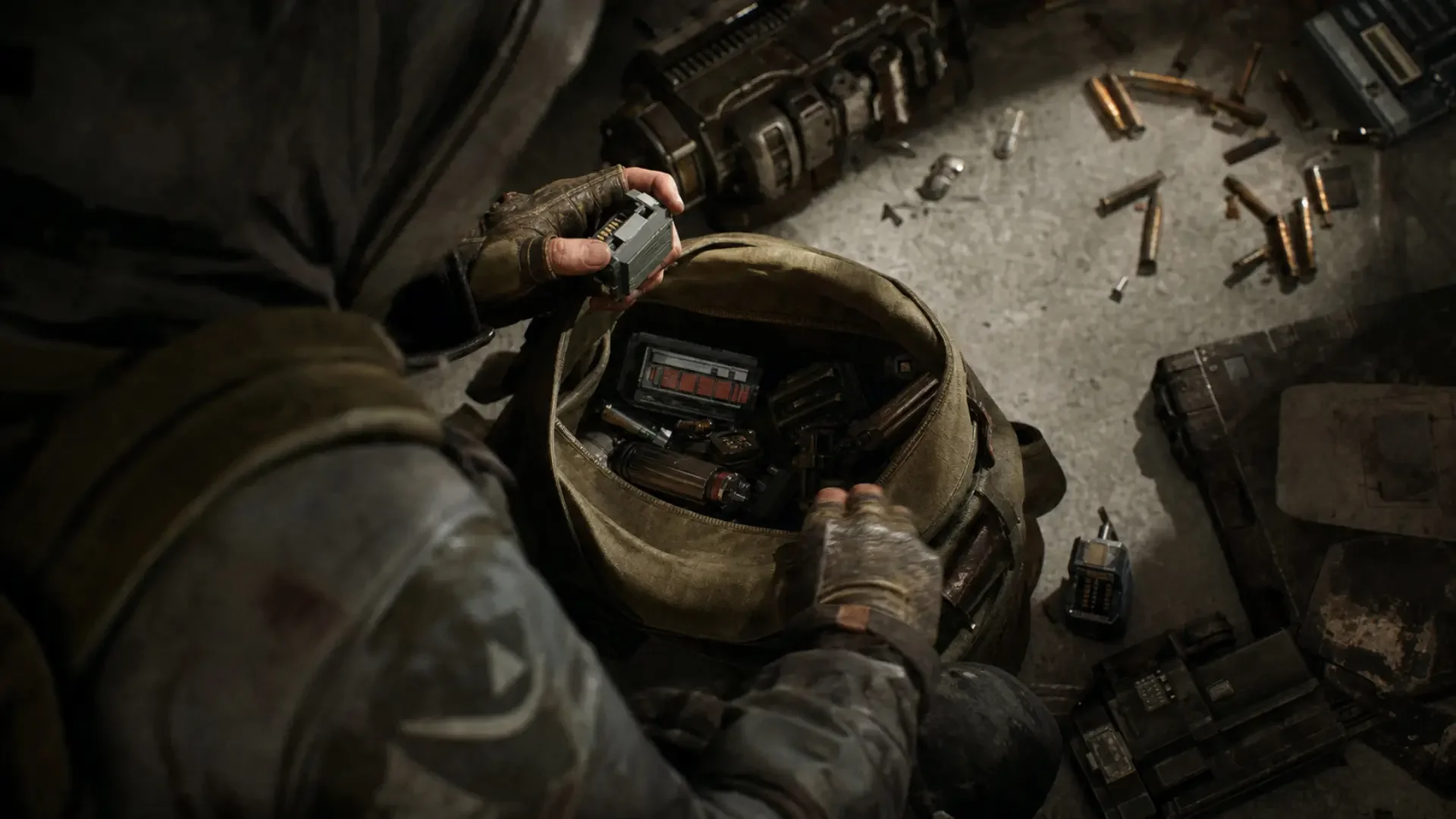 Arc Raiders scavenger sorting salvaged tech components into a backpack