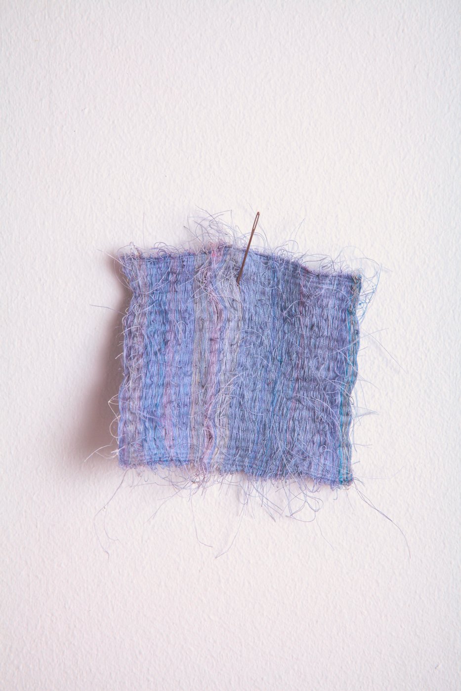 'Woven Repair (Compress)', 2021. 
Silk. 8 x 9 cm. Photography by Tim Spreadbury.