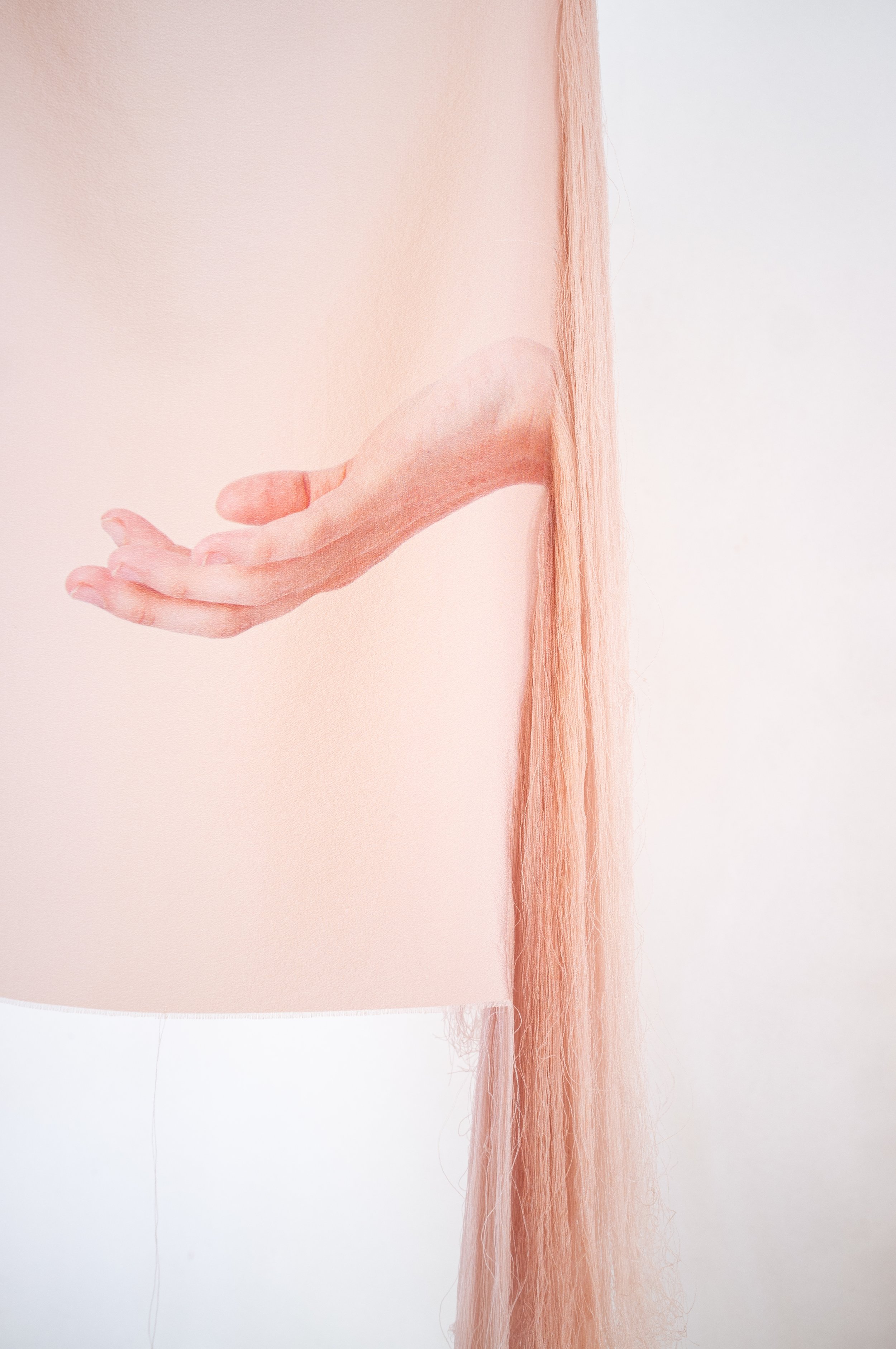 'The Body is A Channel' (detail), 2026. 
Silk, silver. 96 x 30 cm.