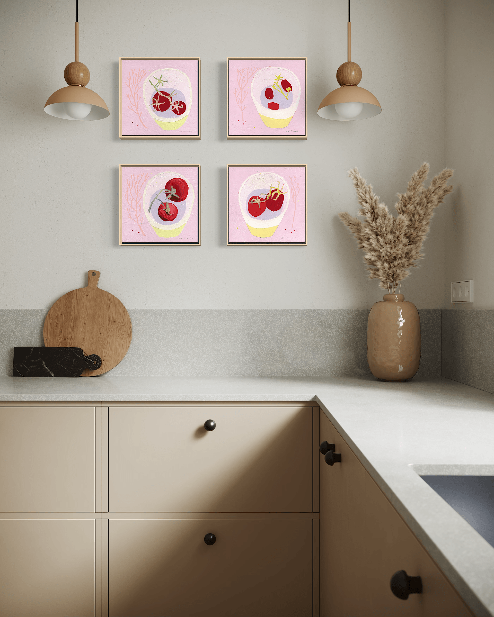 A grid layout of four square framed contemporary tomato paintings on board styled on a neutral beige kitchen wall above a clean countertop with a wooden cutting board and a vase of dried grasses.