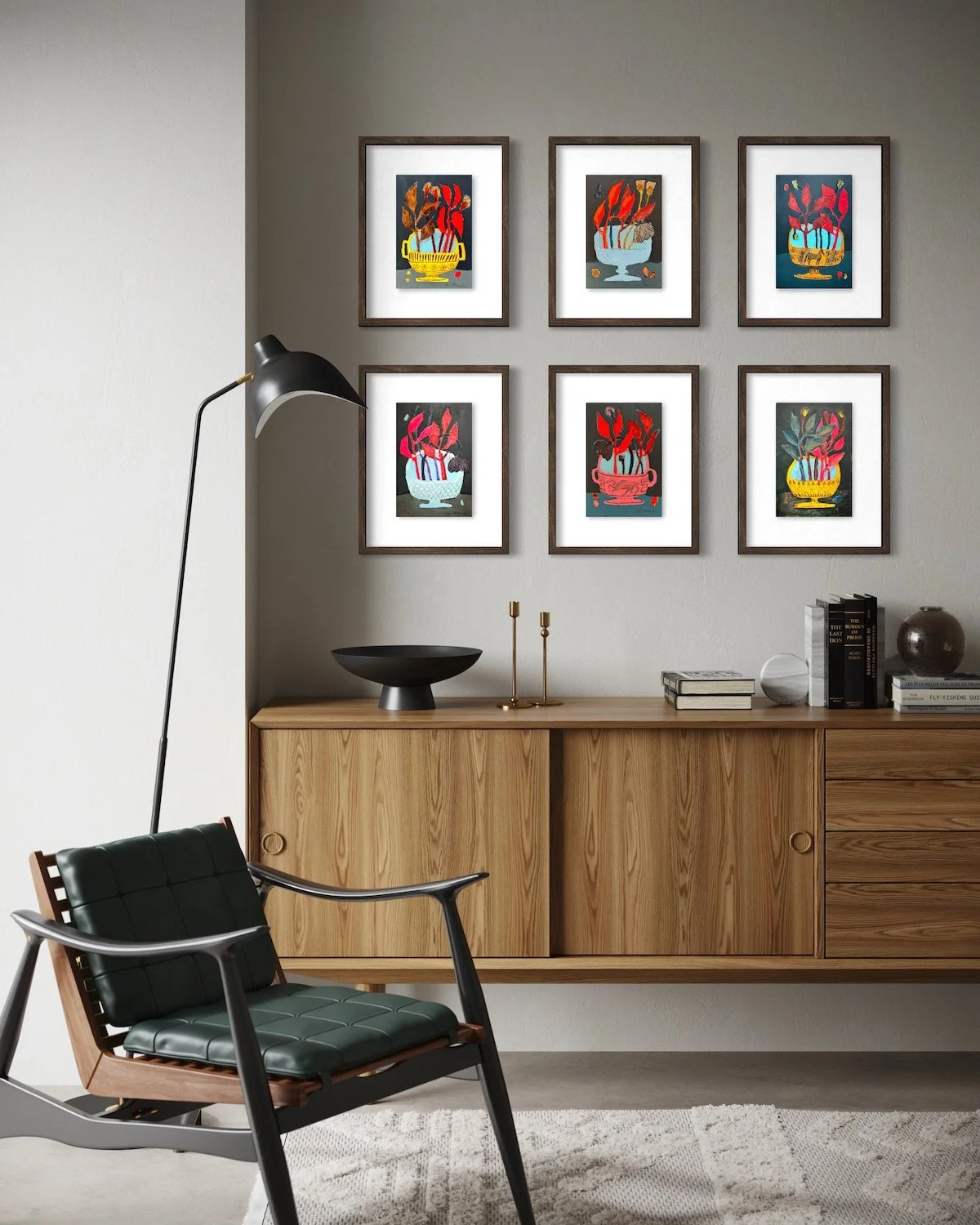 Ali Mackie Posy Dishes collection grid of six framed colourful small original paintings above a mid century wooden sideboard with black armchair