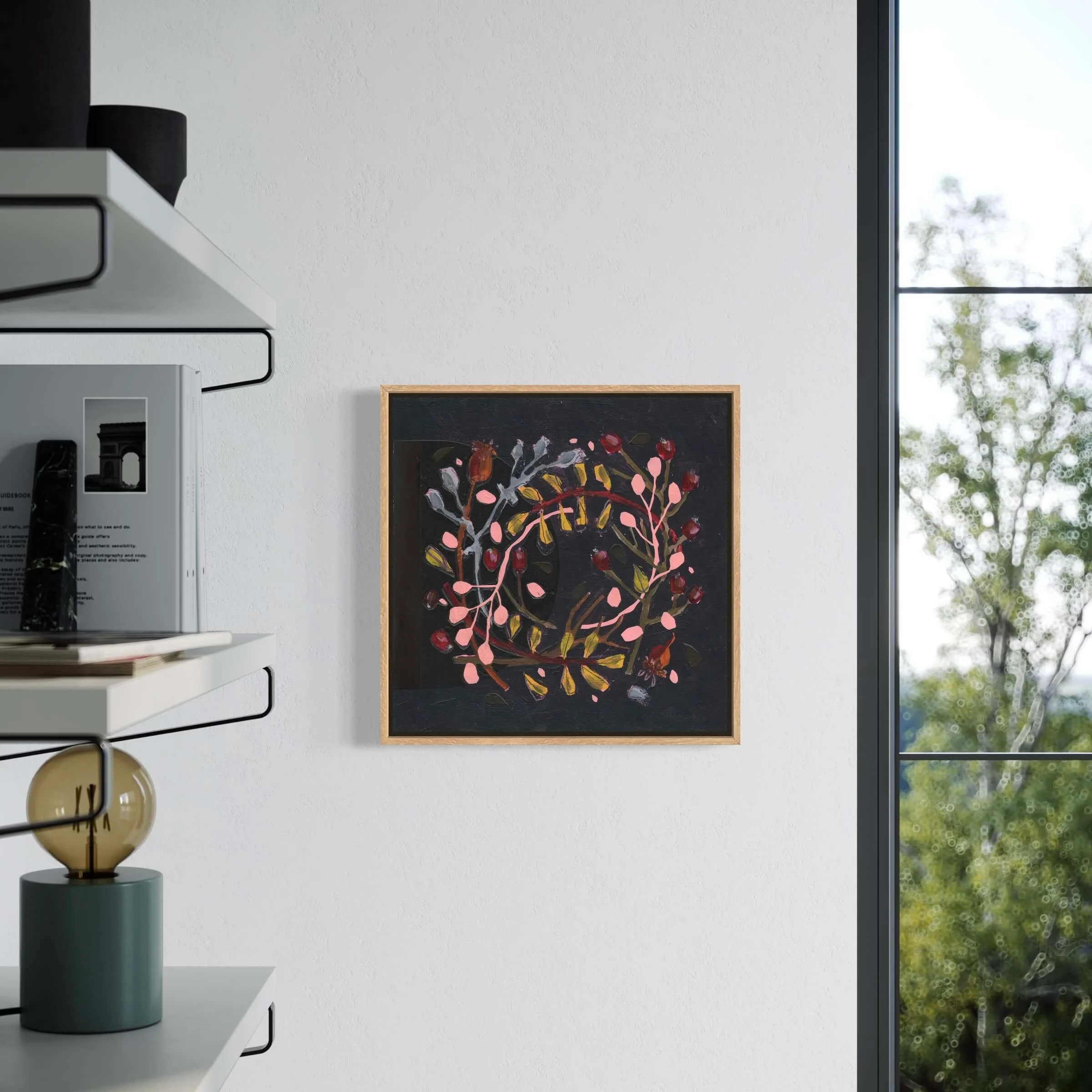 Wallis moody botanical painting mounted on a white study wall next to a bright window and shelving unit.