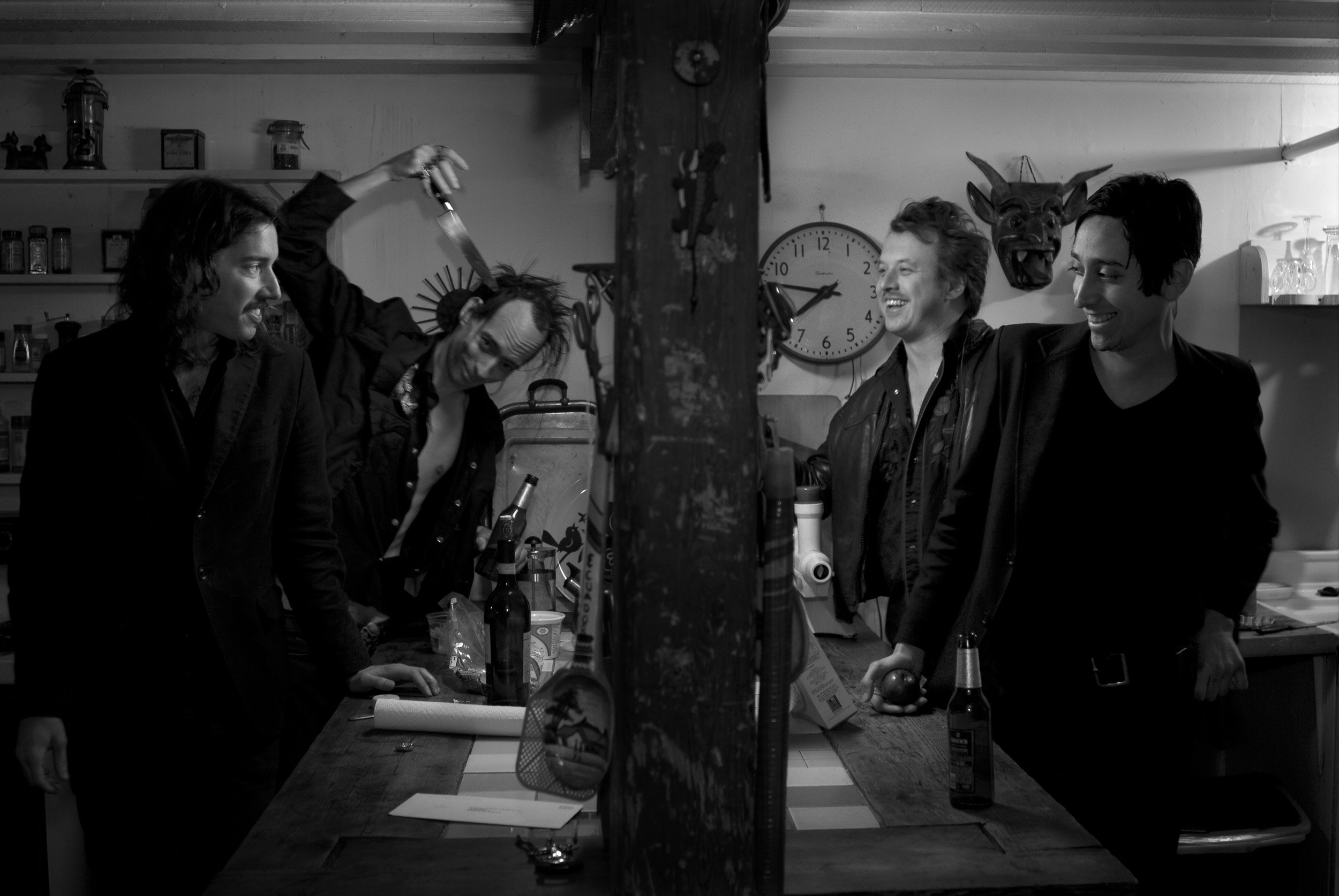 Group portrait of the band Woman in their kitchen in Williamsburg/Brooklyn