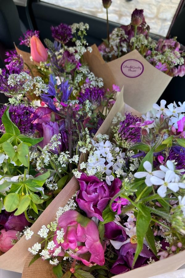 Colourful bunches of flowers in pink, purple and white before delivery in Gloucestershire